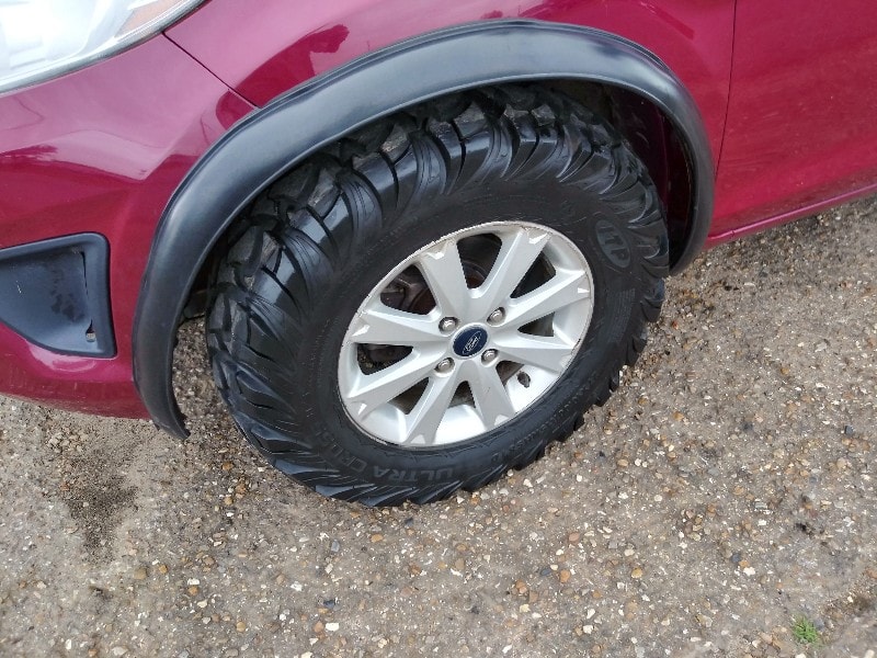 Ford Fiesta Thinks It’s An Off-Roader With ATV Tires And A Rusty Winch