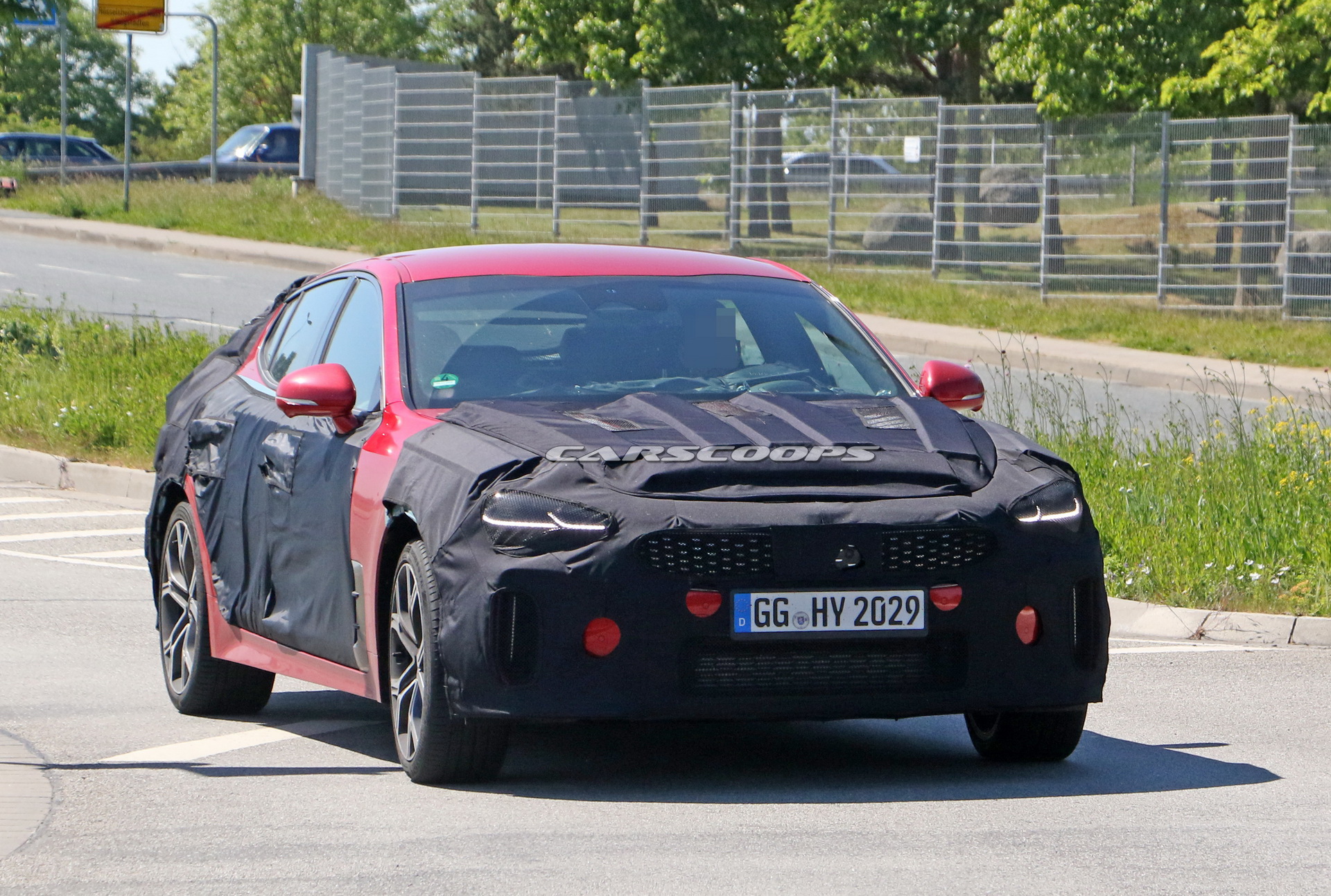 2021 Kia Stinger Facelift Tries To Hide Small Styling Changes Under Heavy Camo