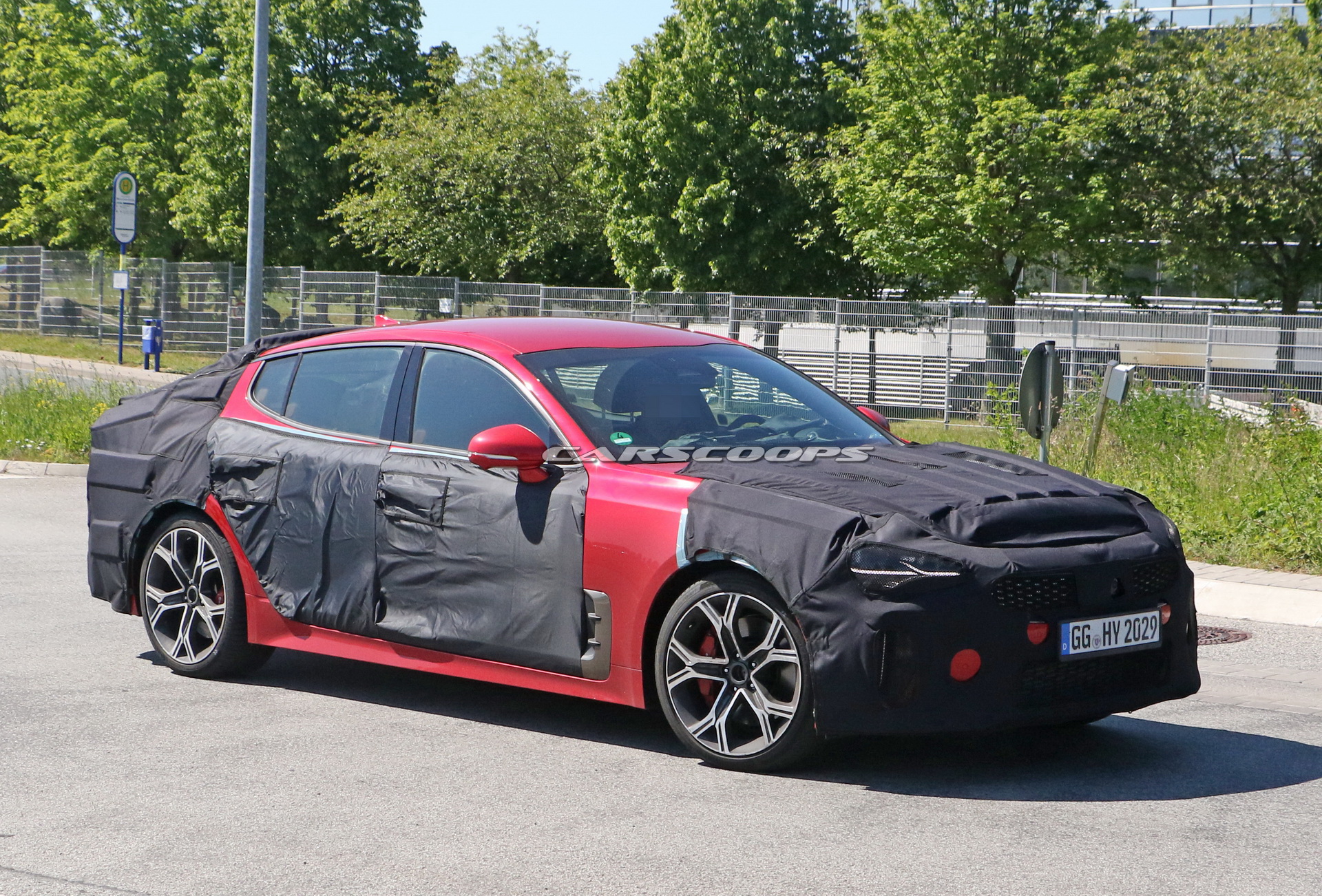 2021 Kia Stinger Facelift Tries To Hide Small Styling Changes Under Heavy Camo