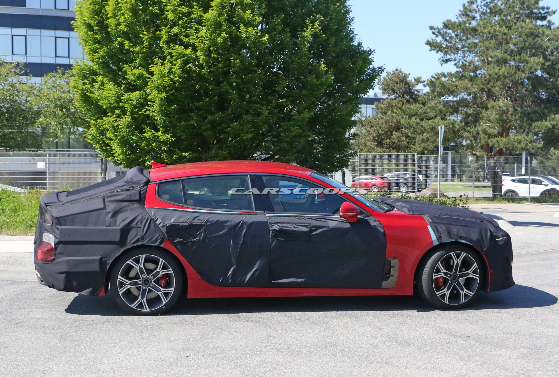 2021 Kia Stinger Facelift Tries To Hide Small Styling Changes Under Heavy Camo
