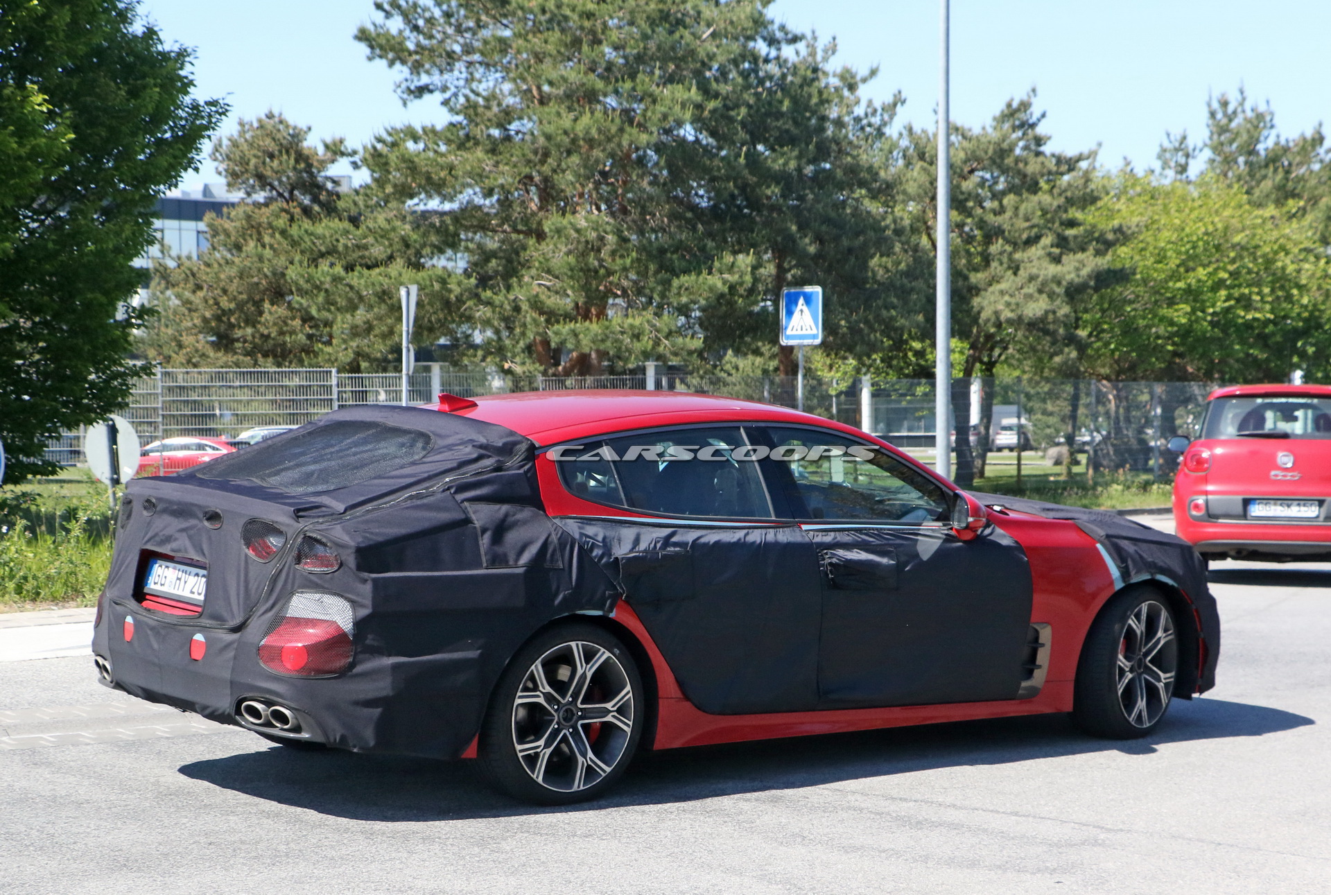 2021 Kia Stinger Facelift Tries To Hide Small Styling Changes Under Heavy Camo