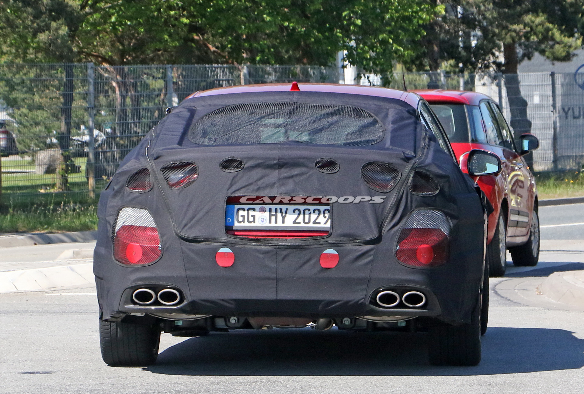 2021 Kia Stinger Facelift Tries To Hide Small Styling Changes Under Heavy Camo