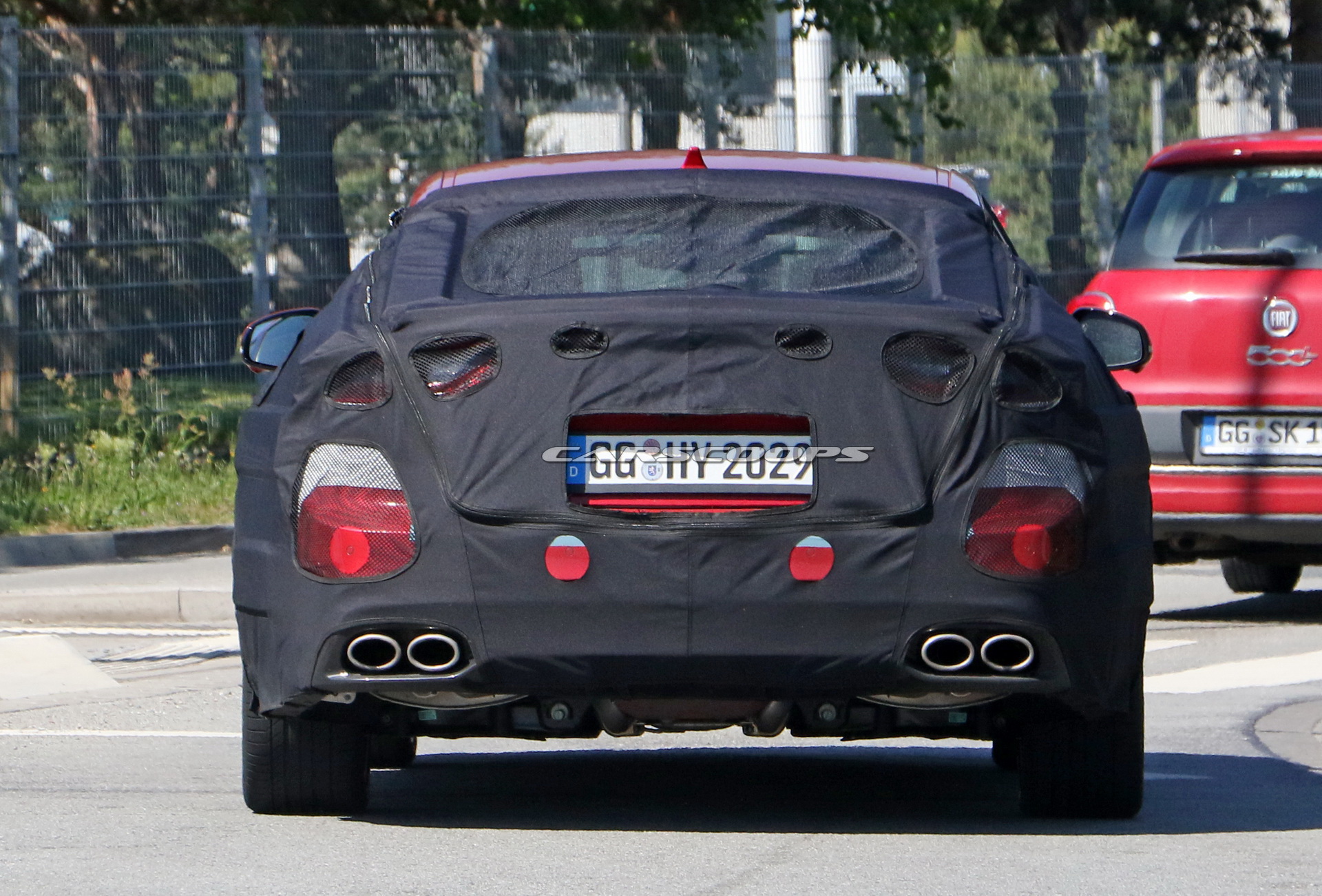 2021 Kia Stinger Facelift Tries To Hide Small Styling Changes Under Heavy Camo