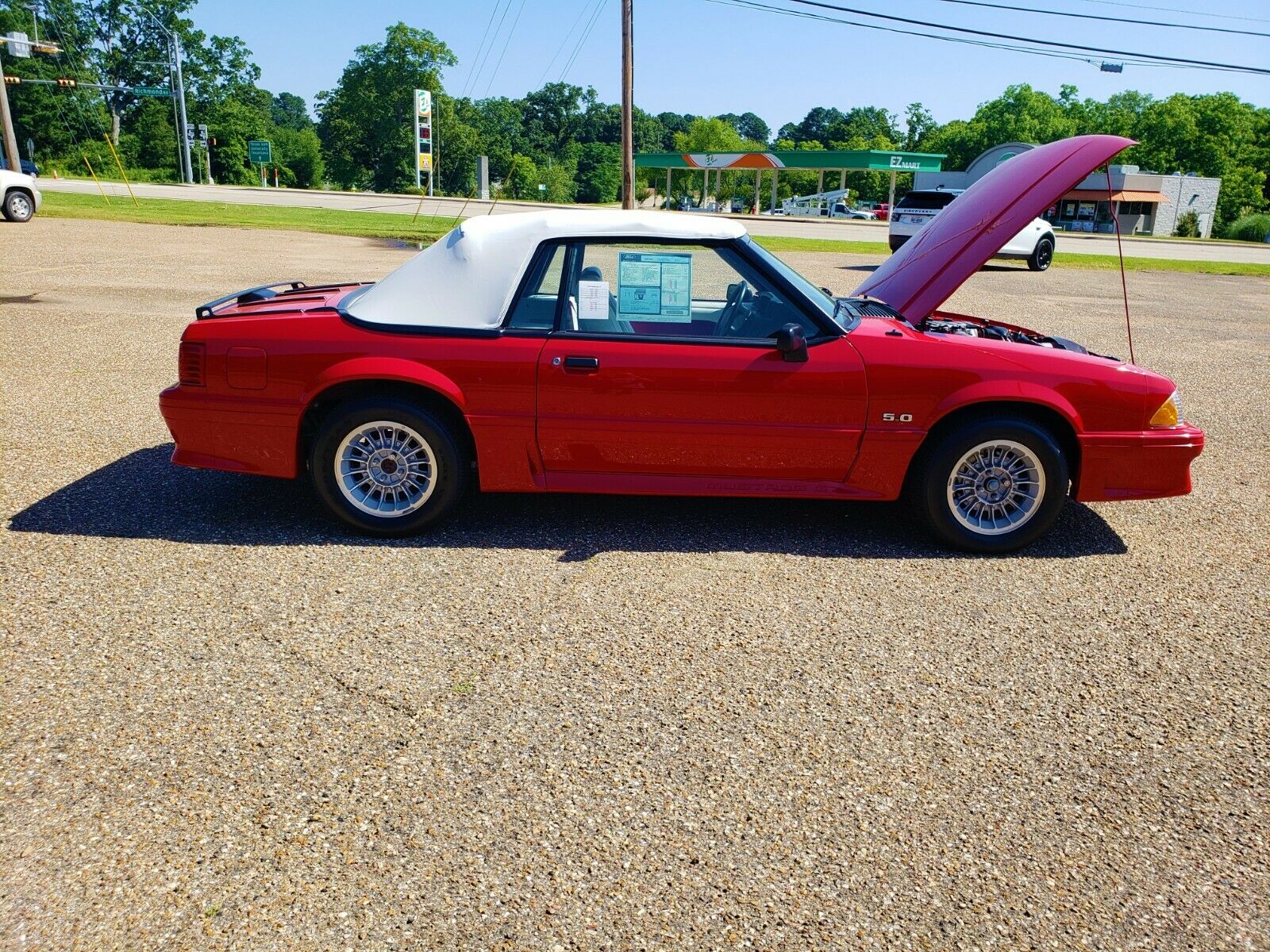 Would You Rather Have A Barely-Driven 1990 Ford Mustang Convertible Or A 2020 Mustang GT?