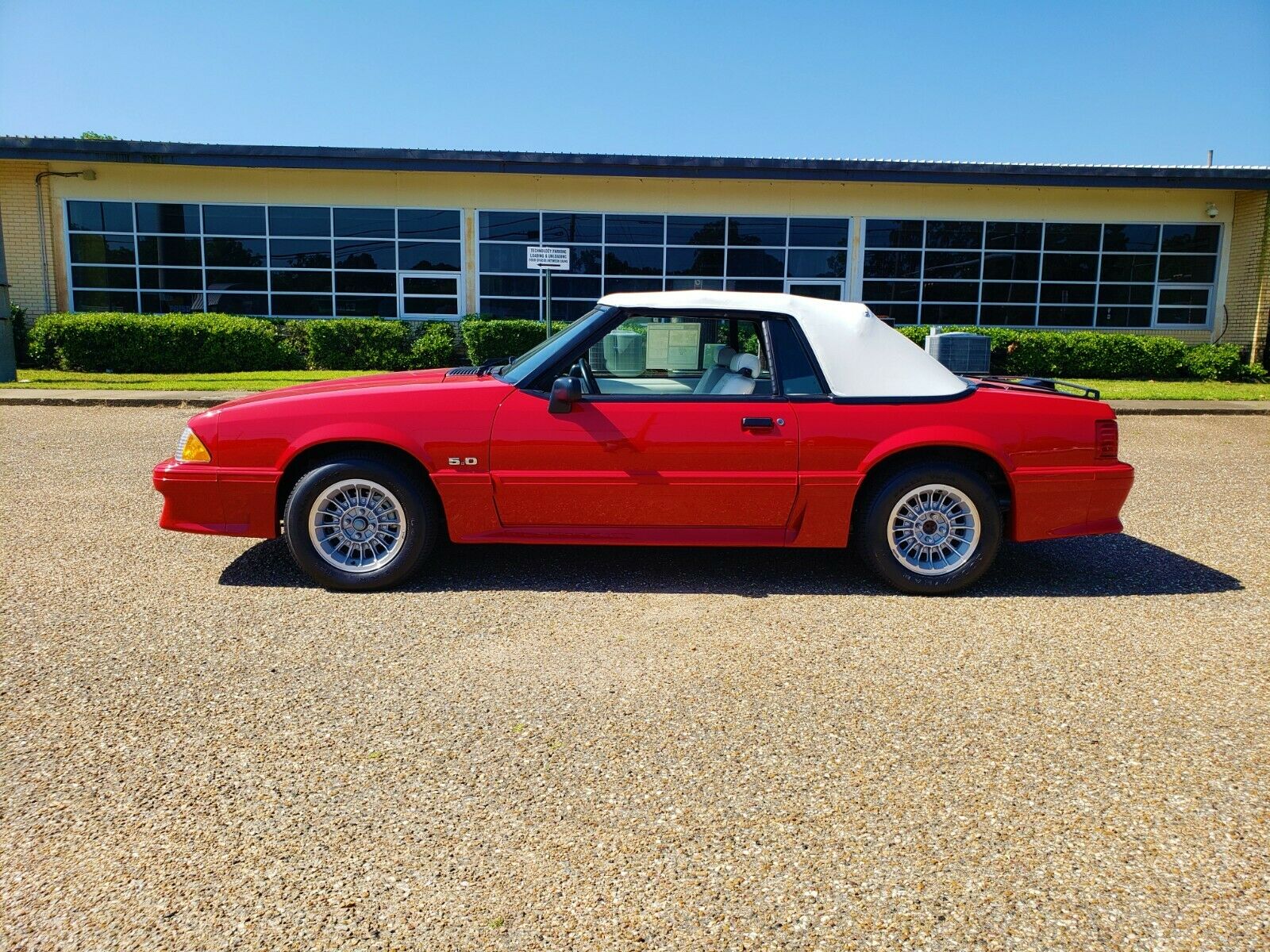 Would You Rather Have A Barely-Driven 1990 Ford Mustang Convertible Or A 2020 Mustang GT?