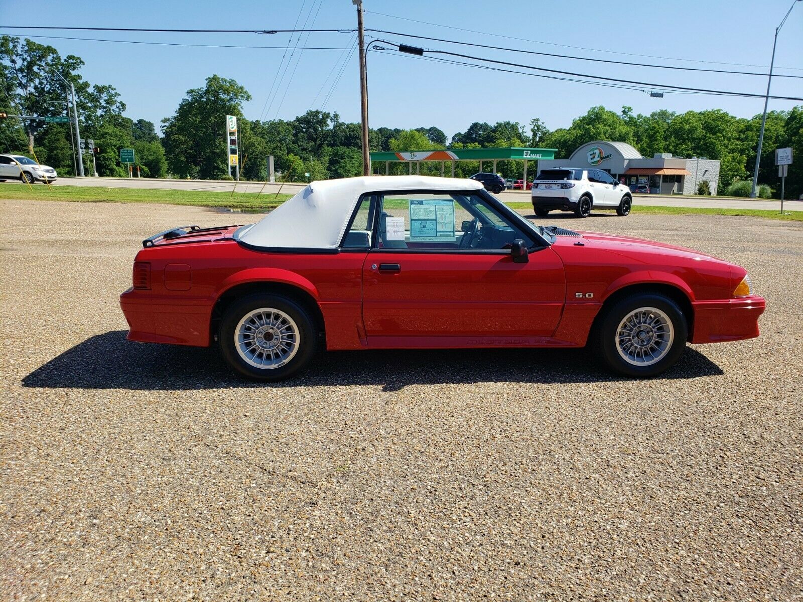 Would You Rather Have A Barely-Driven 1990 Ford Mustang Convertible Or A 2020 Mustang GT?