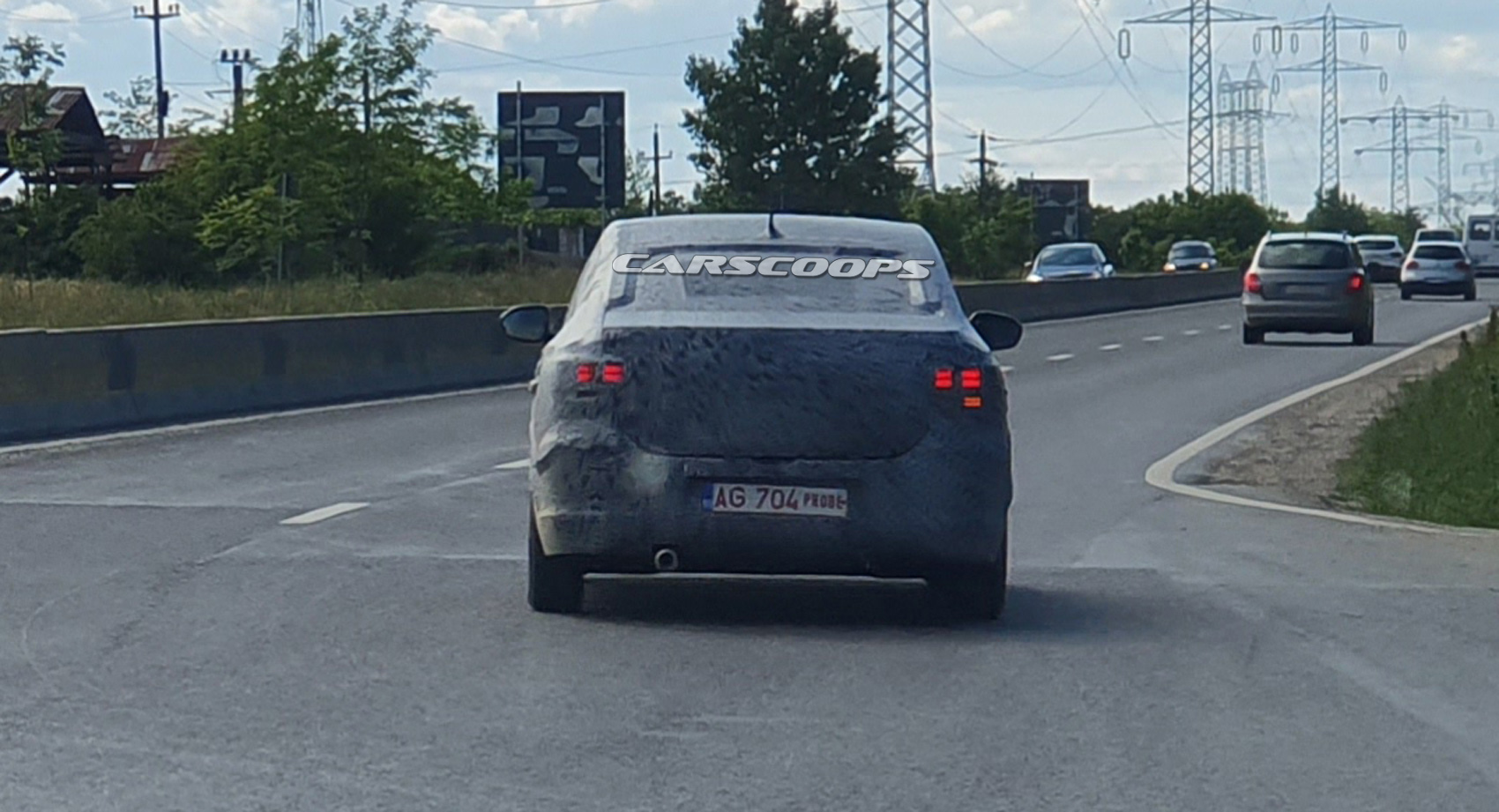 2021 Dacia Logan Spied Rubbing Shoulders With Mysterious Renault Twingo Tester