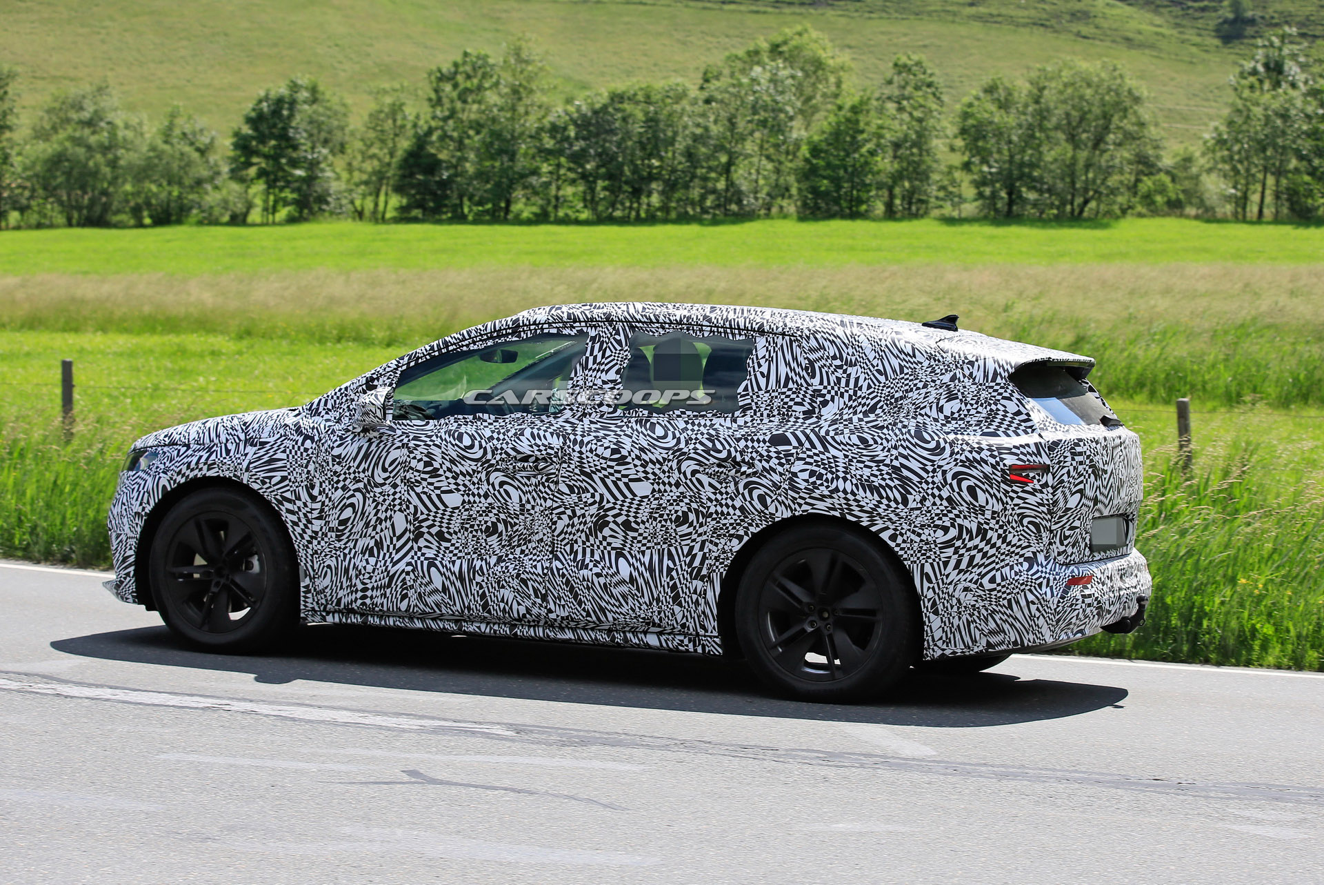 New Electric Skoda Enyaq iV Sheds Most Camo To Reveal VW ID.4 Roots In Latest Scoop