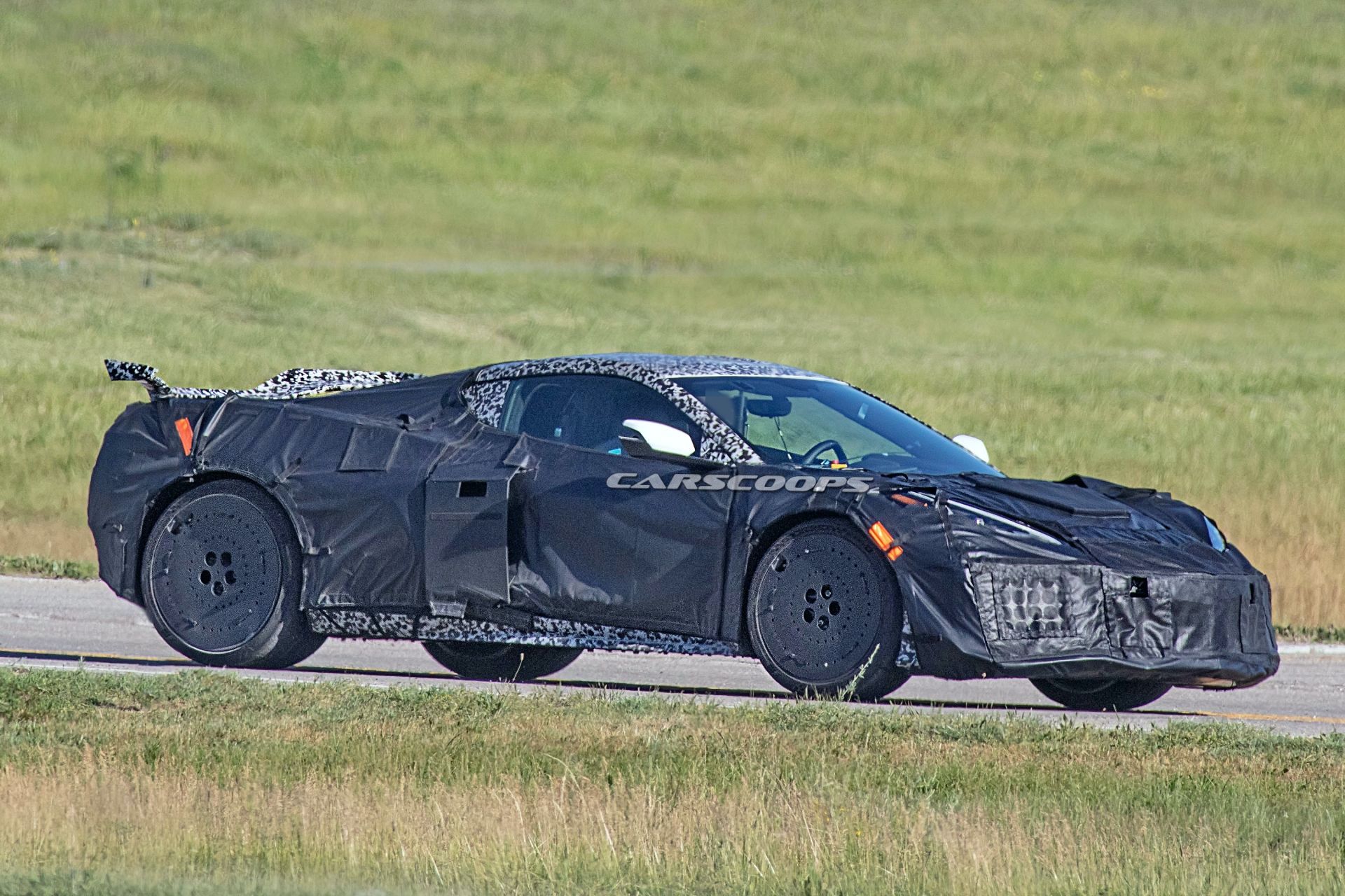 2022 Chevrolet Corvette Z06 Prototype Spied With Aggressive Wing, Covered Wheels