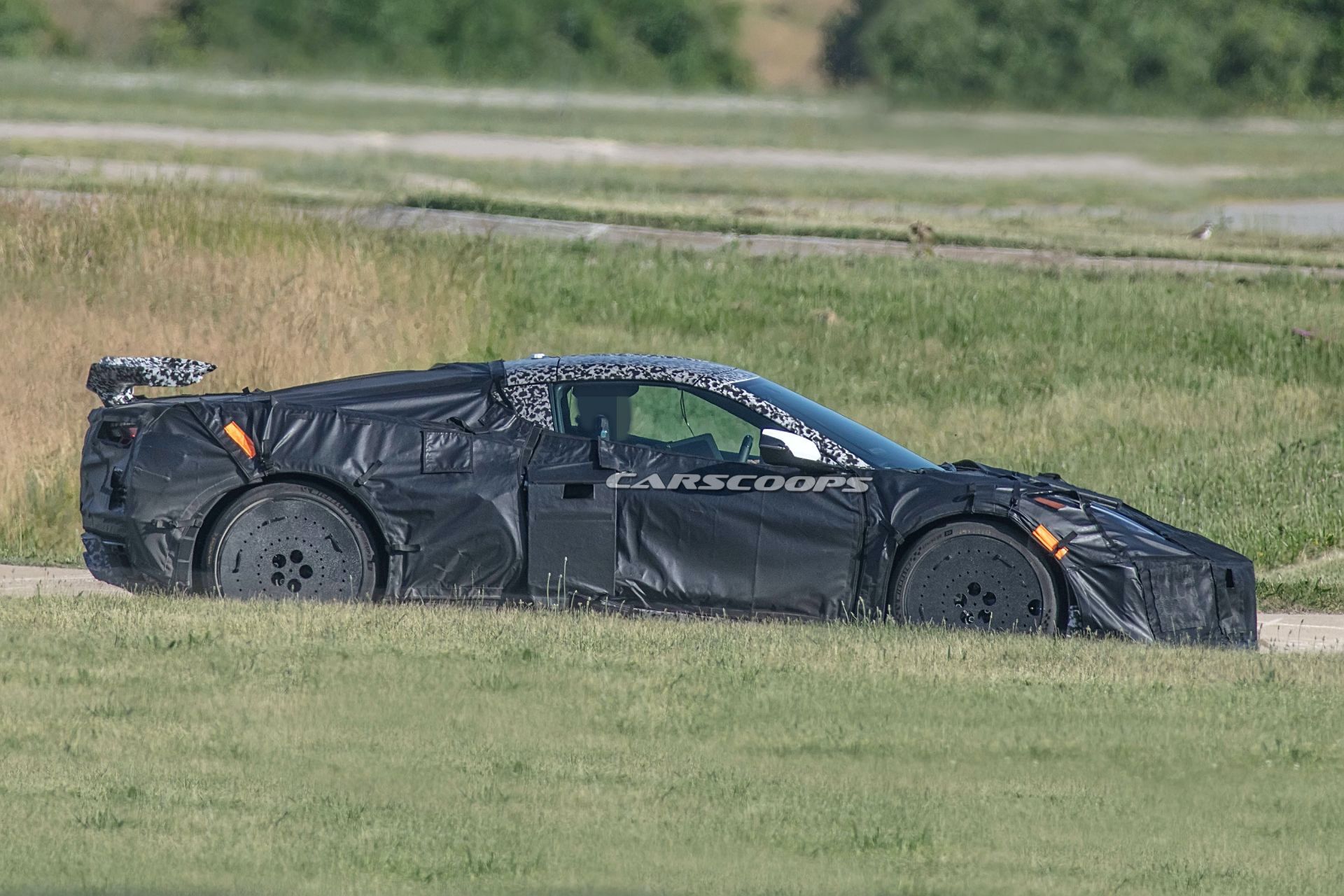 2022 Chevrolet Corvette Z06 Prototype Spied With Aggressive Wing, Covered Wheels