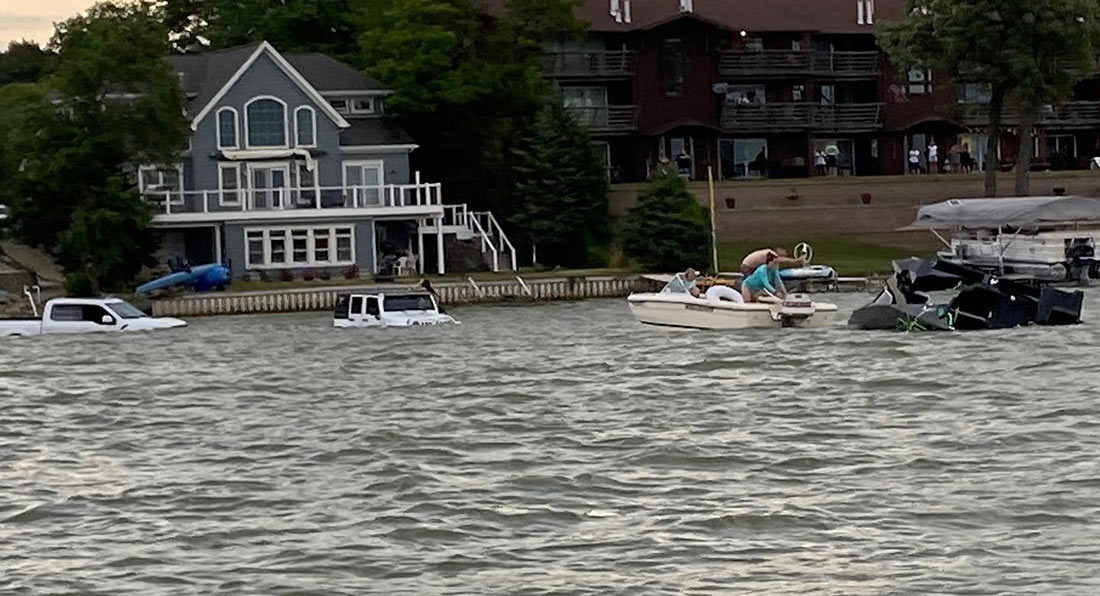 Ford F-150 And Jeep Wrangler Flooded As Owner Tries To 