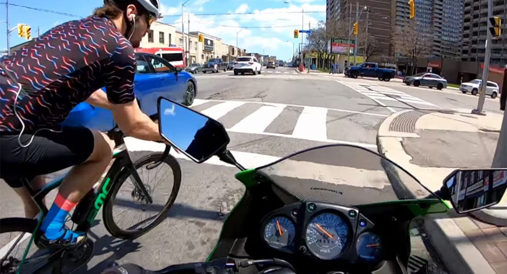 Cyclist And Motorbike Rider Collide in Canada, Who Is At Fault?