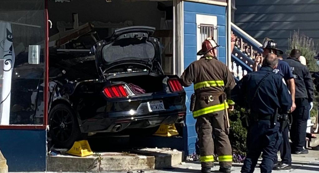 Ford Mustang Driver Gets Confused At Four-Way Stop, Crashes Into House