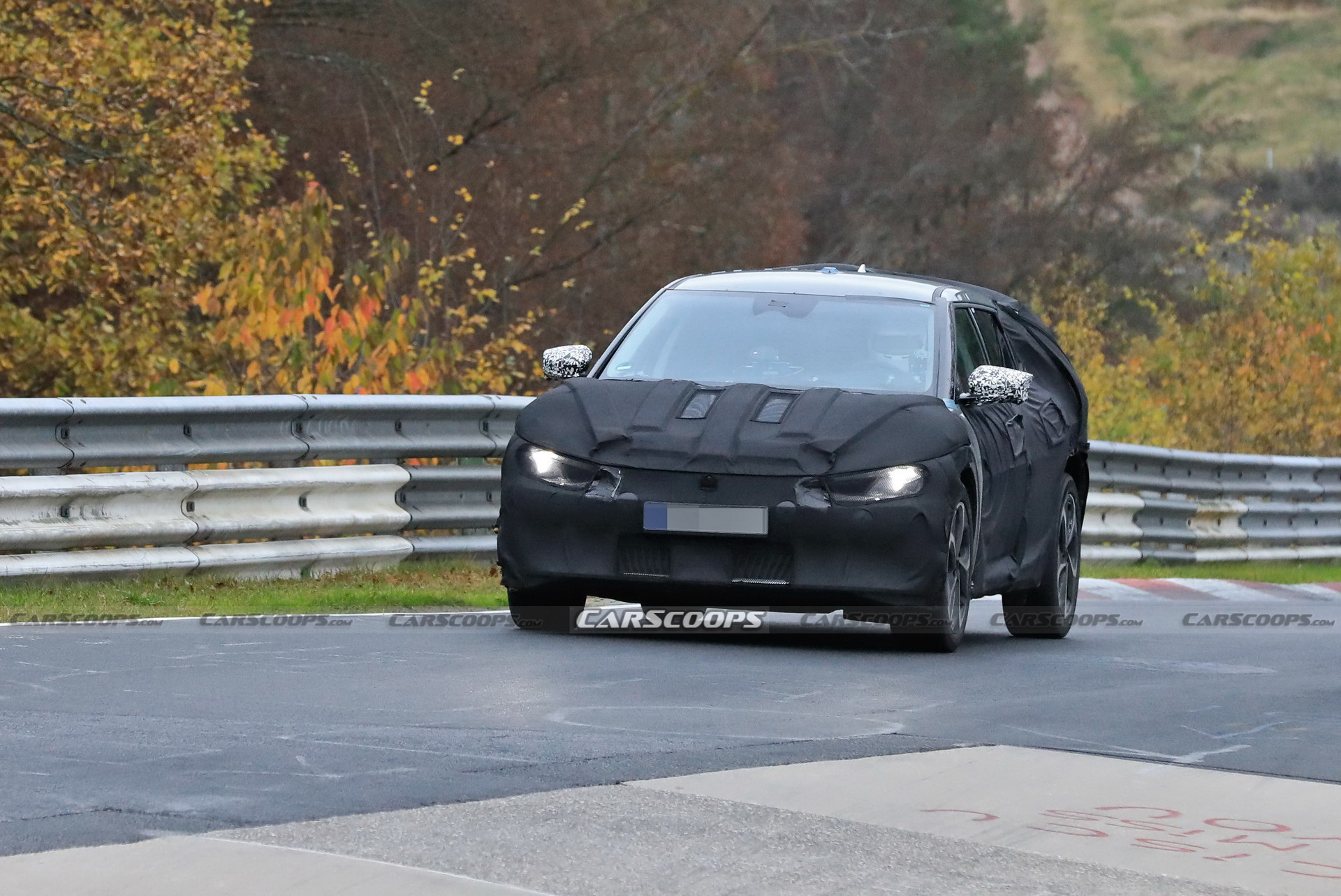 Kia Spied Testing Its All-New EV Alongside A Tesla Model 3