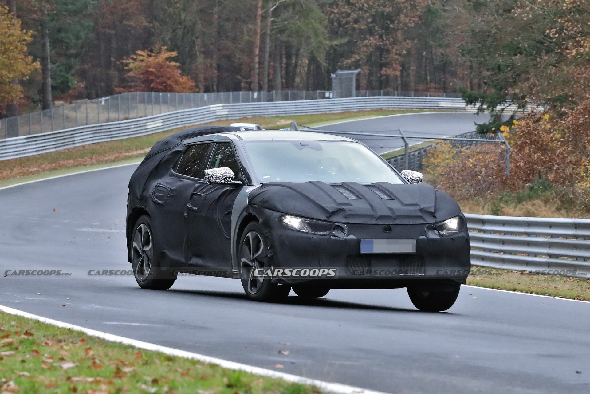 Kia Spied Testing Its All-New EV Alongside A Tesla Model 3