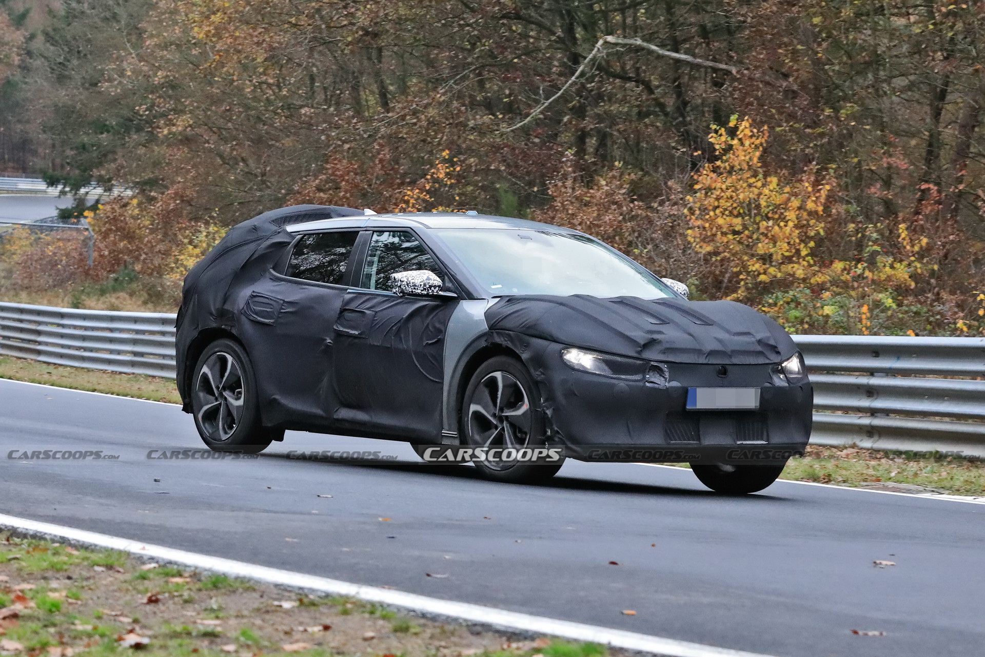 Kia Spied Testing Its All-New EV Alongside A Tesla Model 3