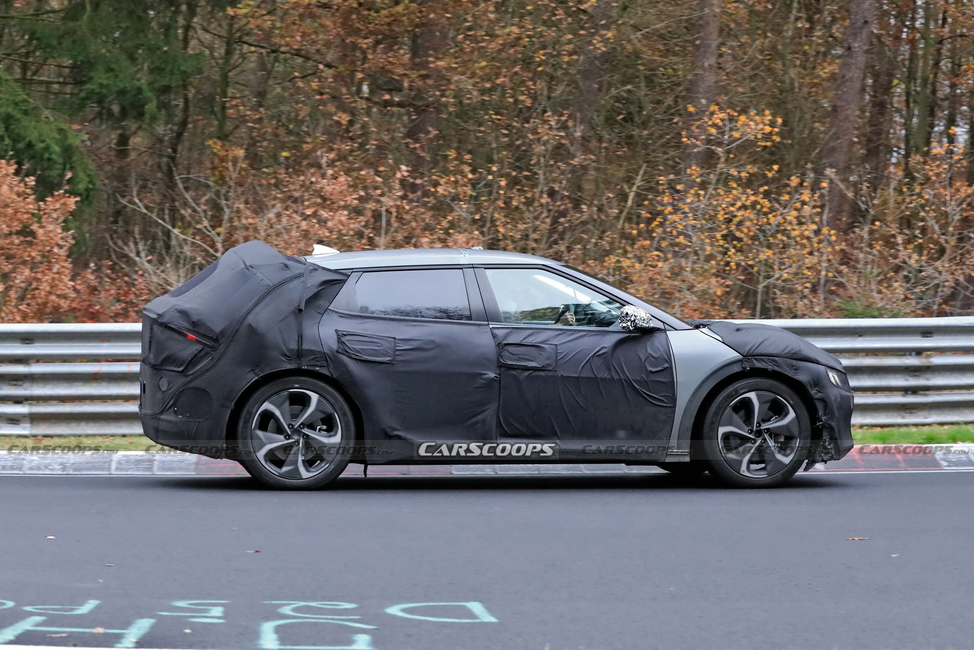 Kia Spied Testing Its All-New EV Alongside A Tesla Model 3