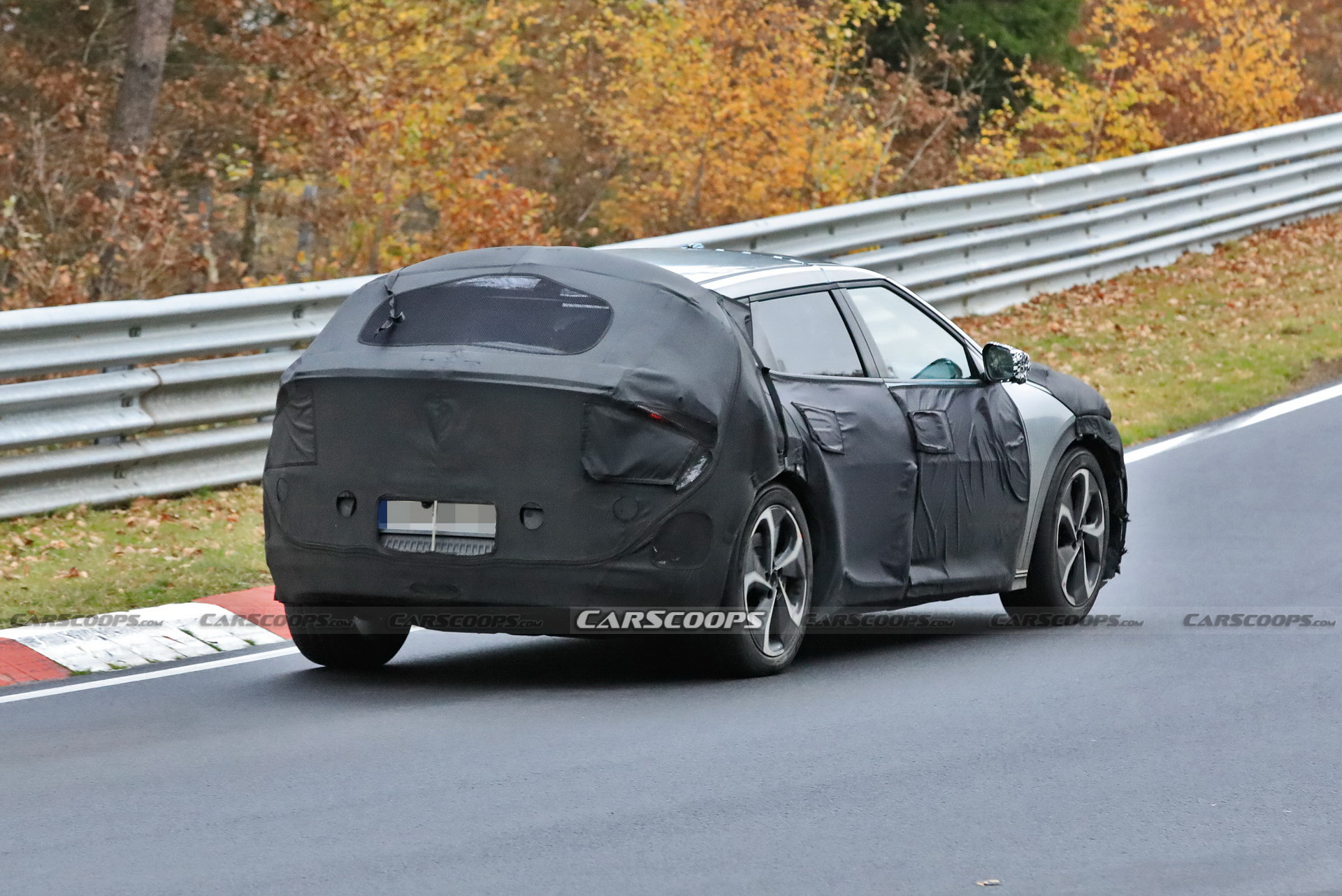 Kia Spied Testing Its All-New EV Alongside A Tesla Model 3