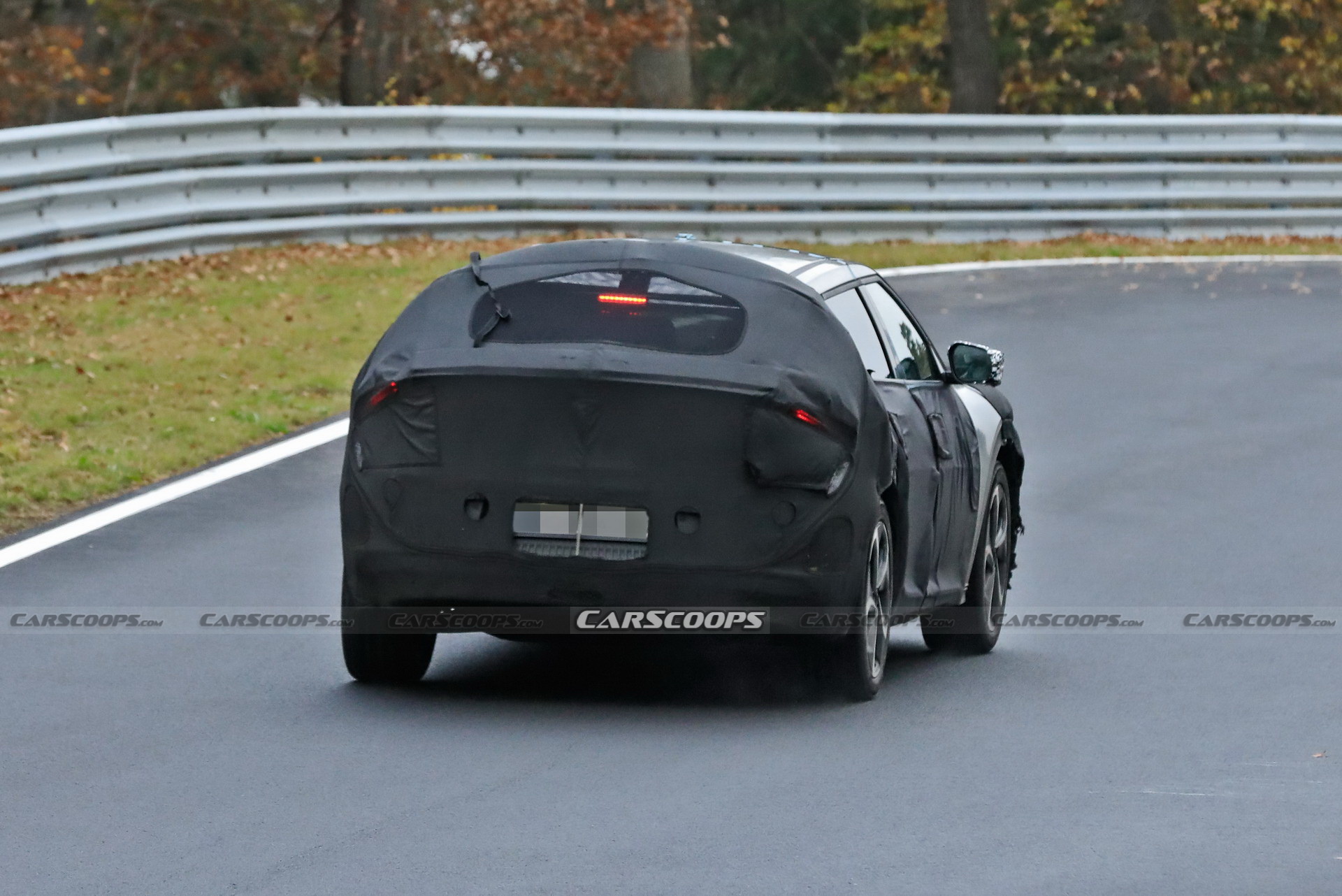 Kia Spied Testing Its All-New EV Alongside A Tesla Model 3