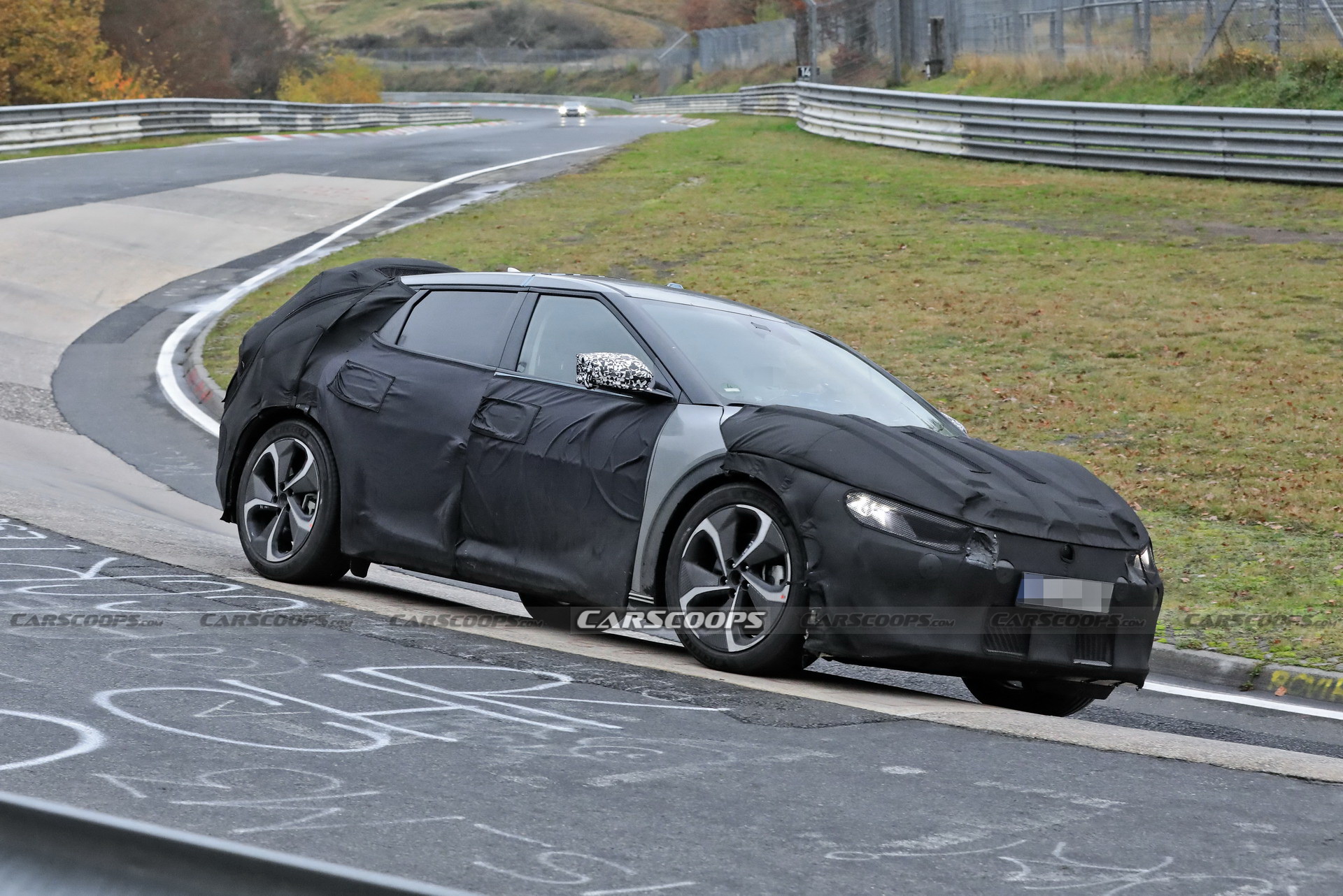Kia Spied Testing Its All-New EV Alongside A Tesla Model 3