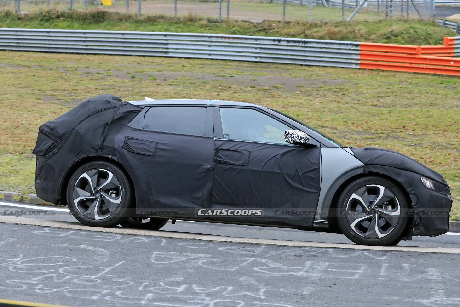 Kia Spied Testing Its All-New EV Alongside A Tesla Model 3