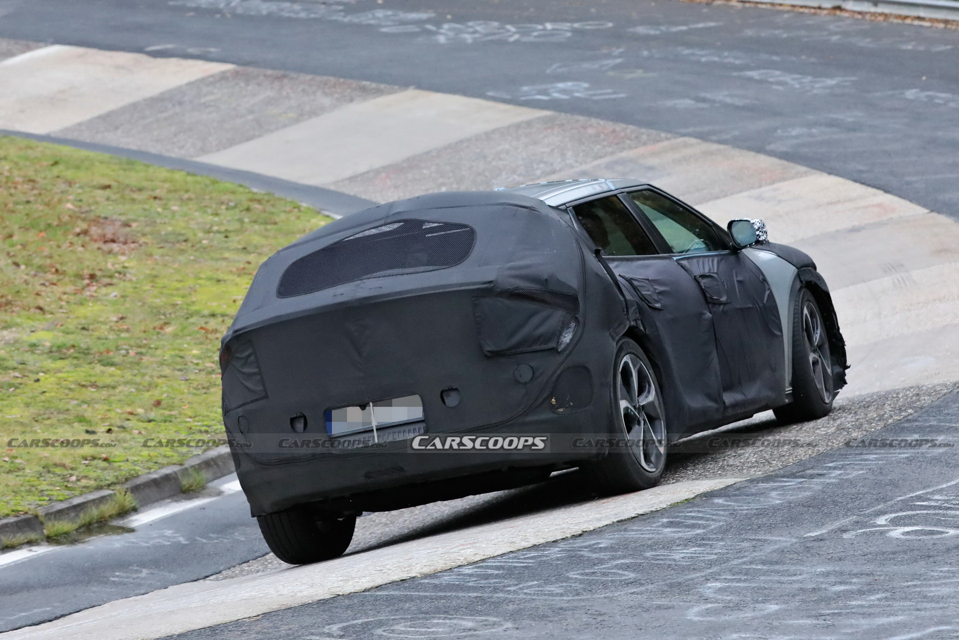 Kia Spied Testing Its All-New EV Alongside A Tesla Model 3