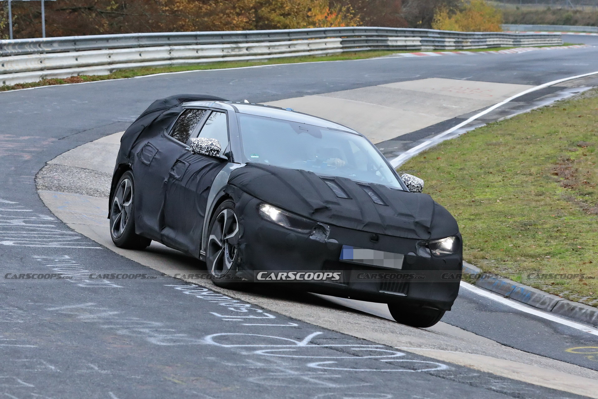 Kia Spied Testing Its All-New EV Alongside A Tesla Model 3