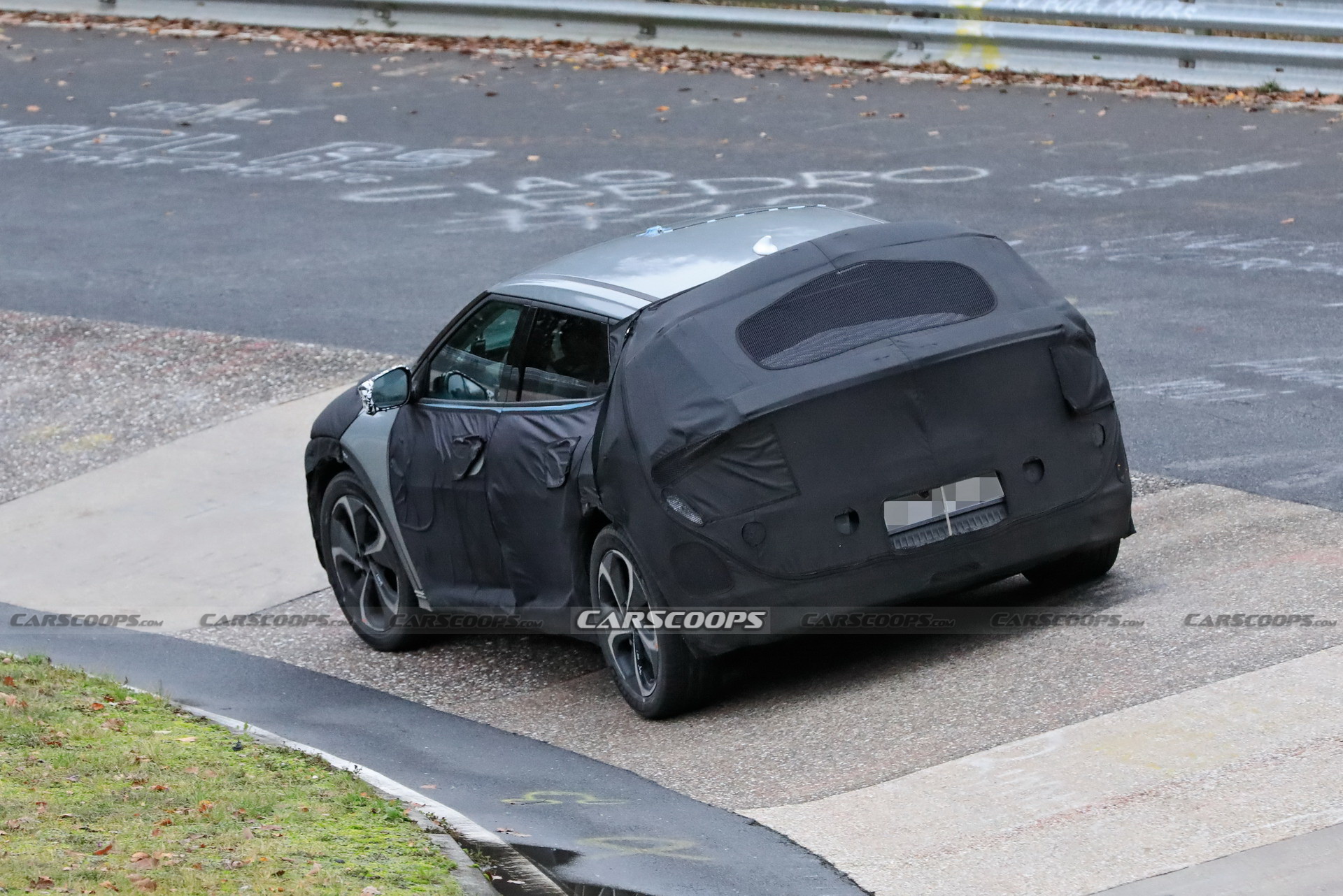 Kia Spied Testing Its All-New EV Alongside A Tesla Model 3