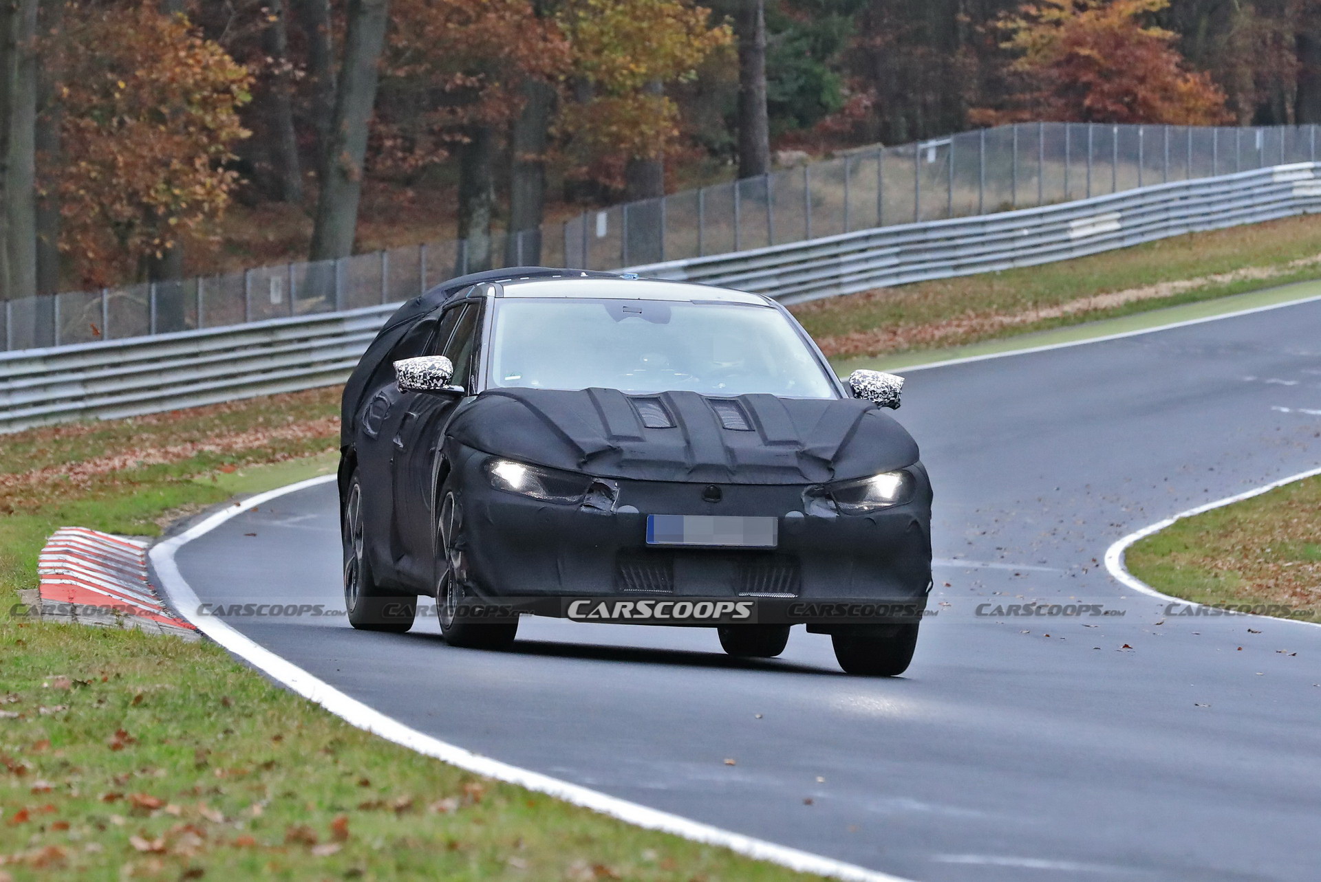 Kia Spied Testing Its All-New EV Alongside A Tesla Model 3