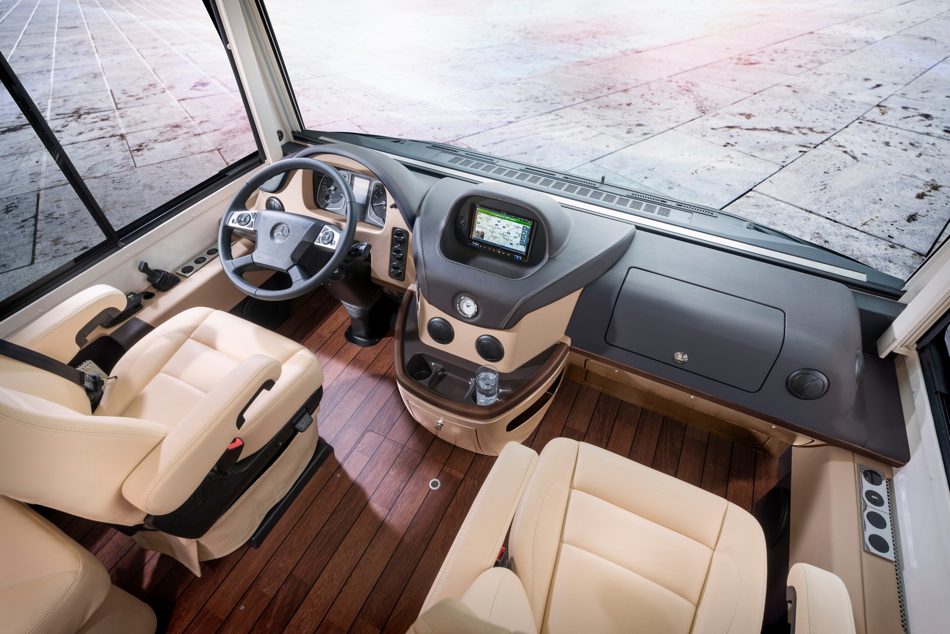 Leave The Toy Hauler At Home And Go Glamping In This Luxury Motorhome With A Built-In Garage