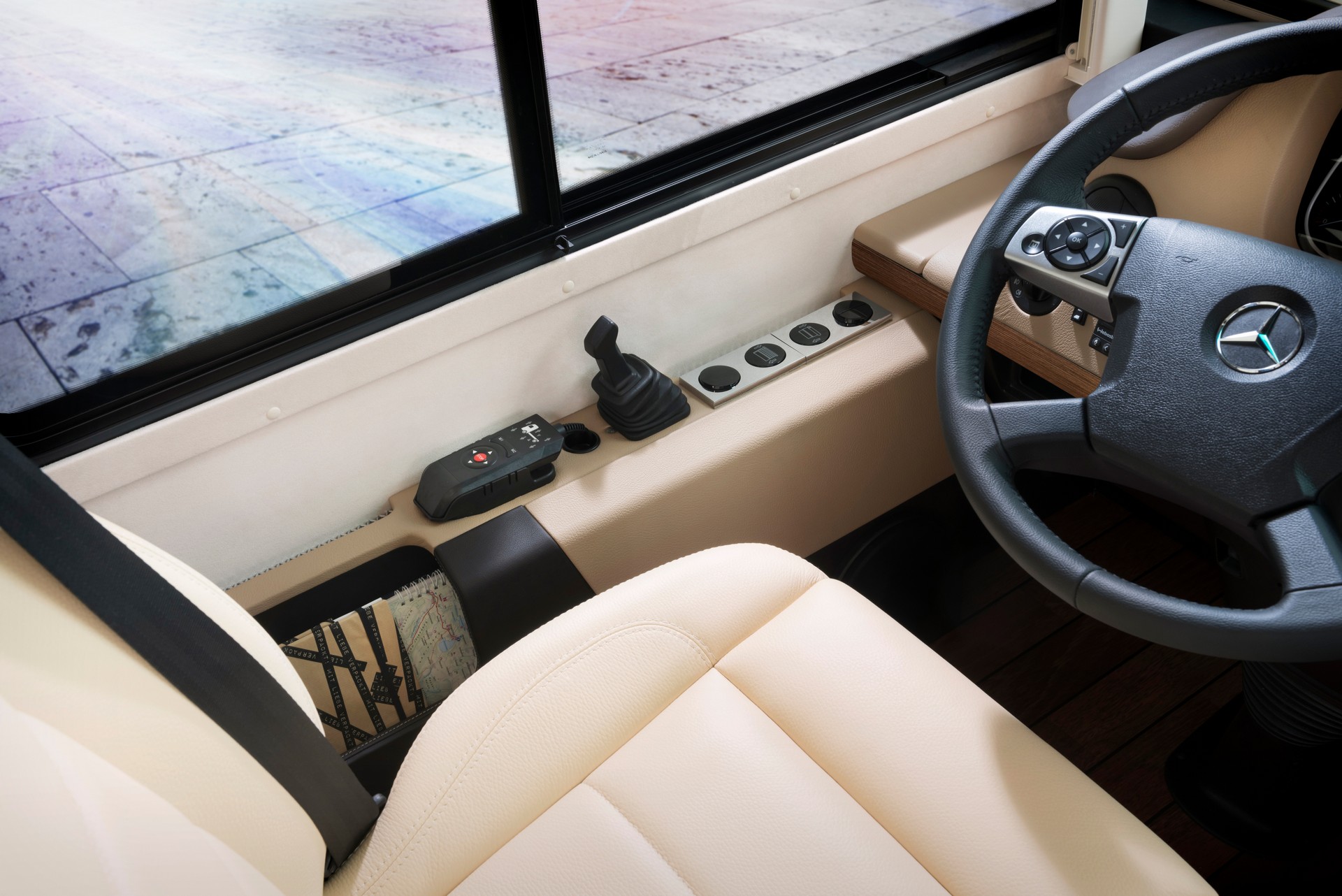 Leave The Toy Hauler At Home And Go Glamping In This Luxury Motorhome With A Built-In Garage