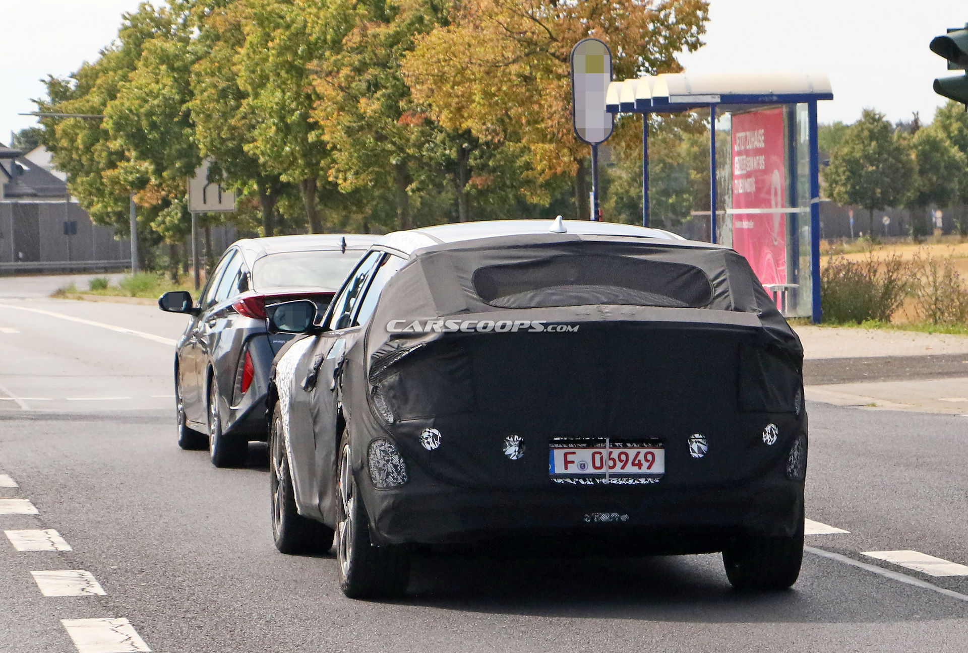 Kia Spied Testing Its All-New EV Alongside A Tesla Model 3
