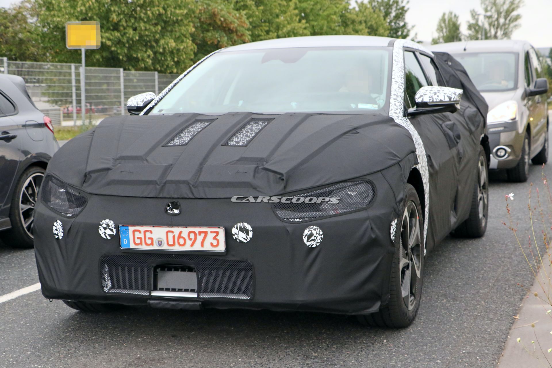 Kia’s New EV Makes Spy Debut, Looks Like A Cross Between Imagine And Futuron Concepts