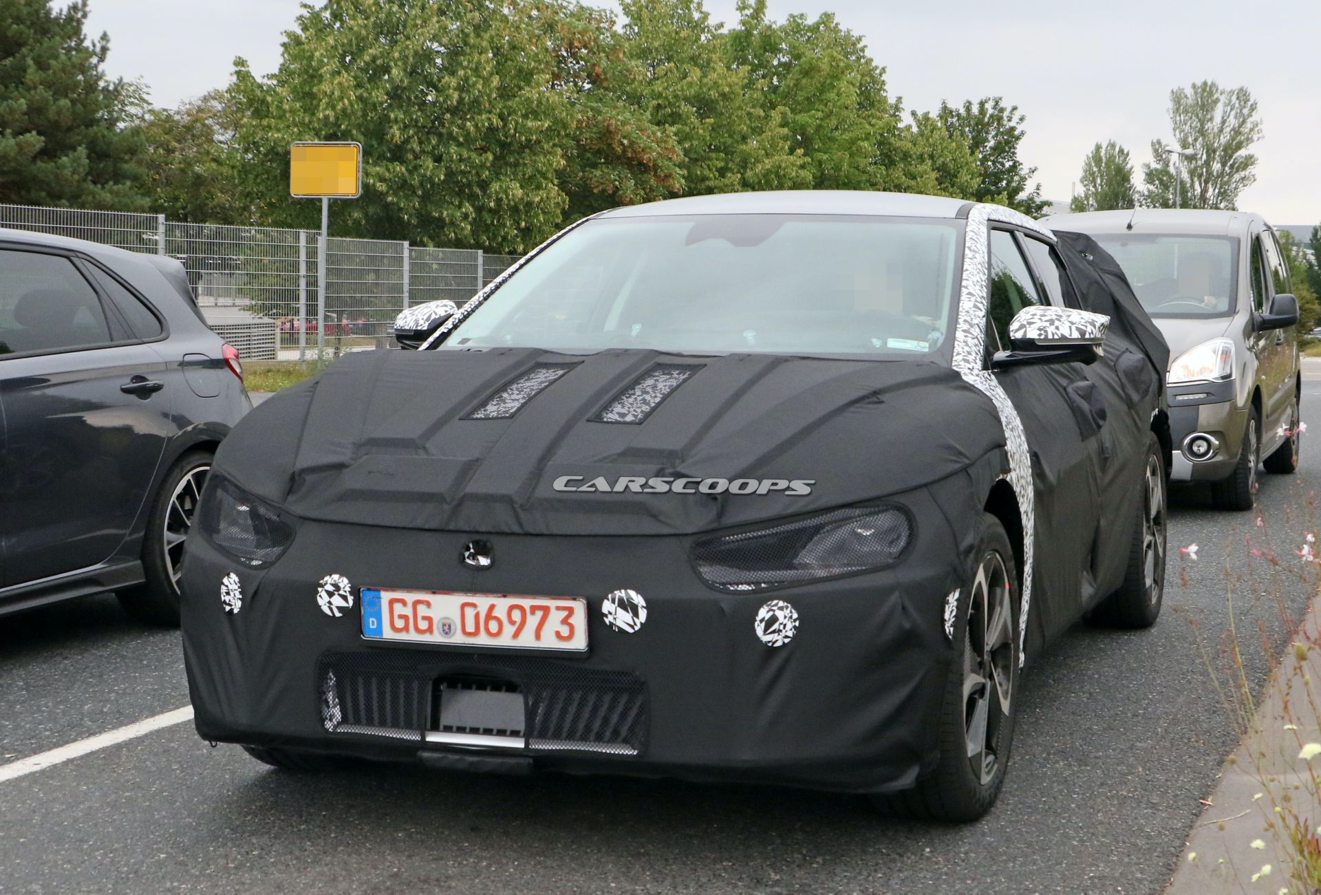 Kia’s New EV Makes Spy Debut, Looks Like A Cross Between Imagine And Futuron Concepts