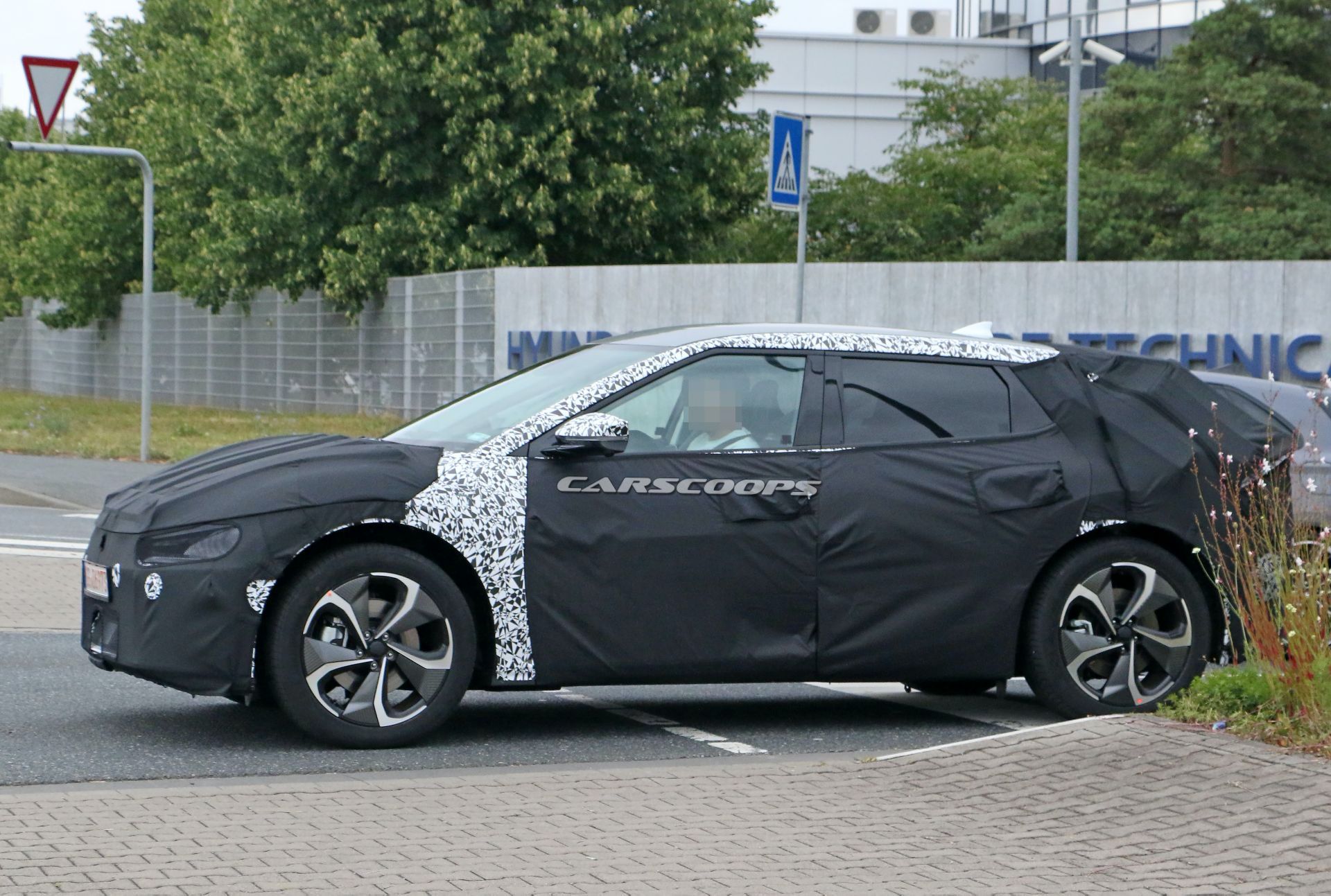 Kia’s New EV Makes Spy Debut, Looks Like A Cross Between Imagine And Futuron Concepts