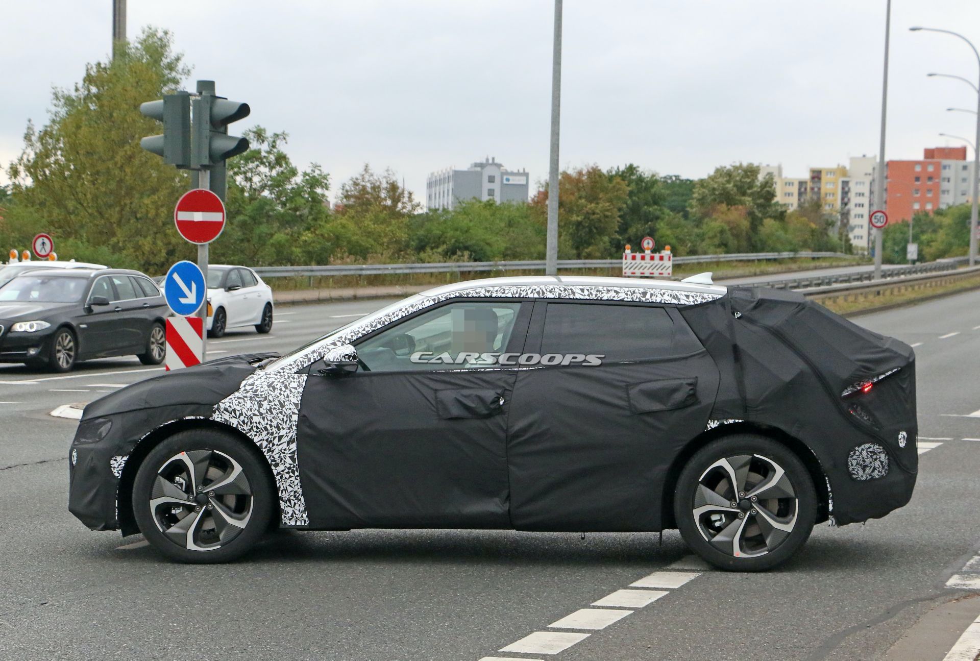 Kia’s New EV Makes Spy Debut, Looks Like A Cross Between Imagine And Futuron Concepts