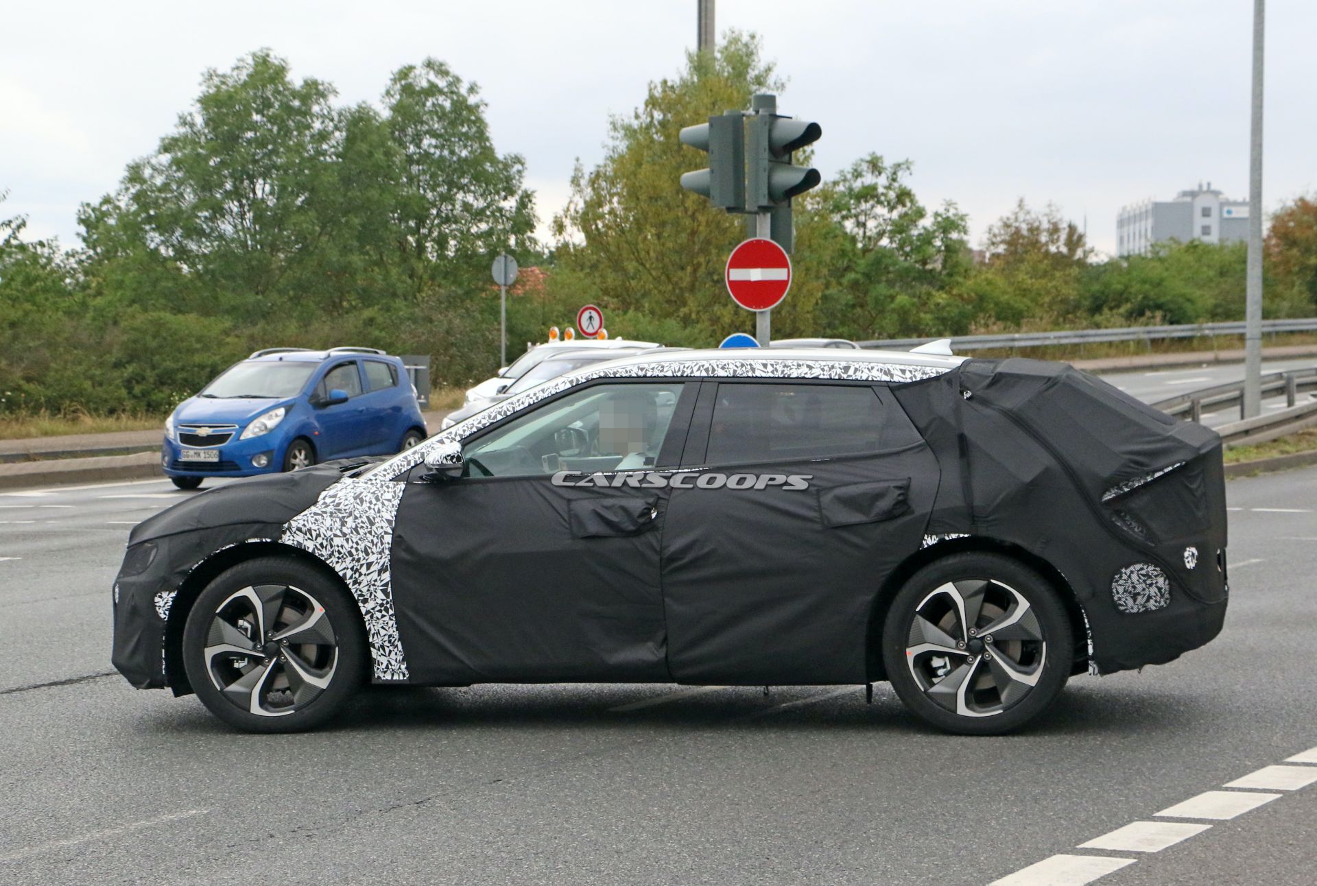 Kia’s New EV Makes Spy Debut, Looks Like A Cross Between Imagine And Futuron Concepts