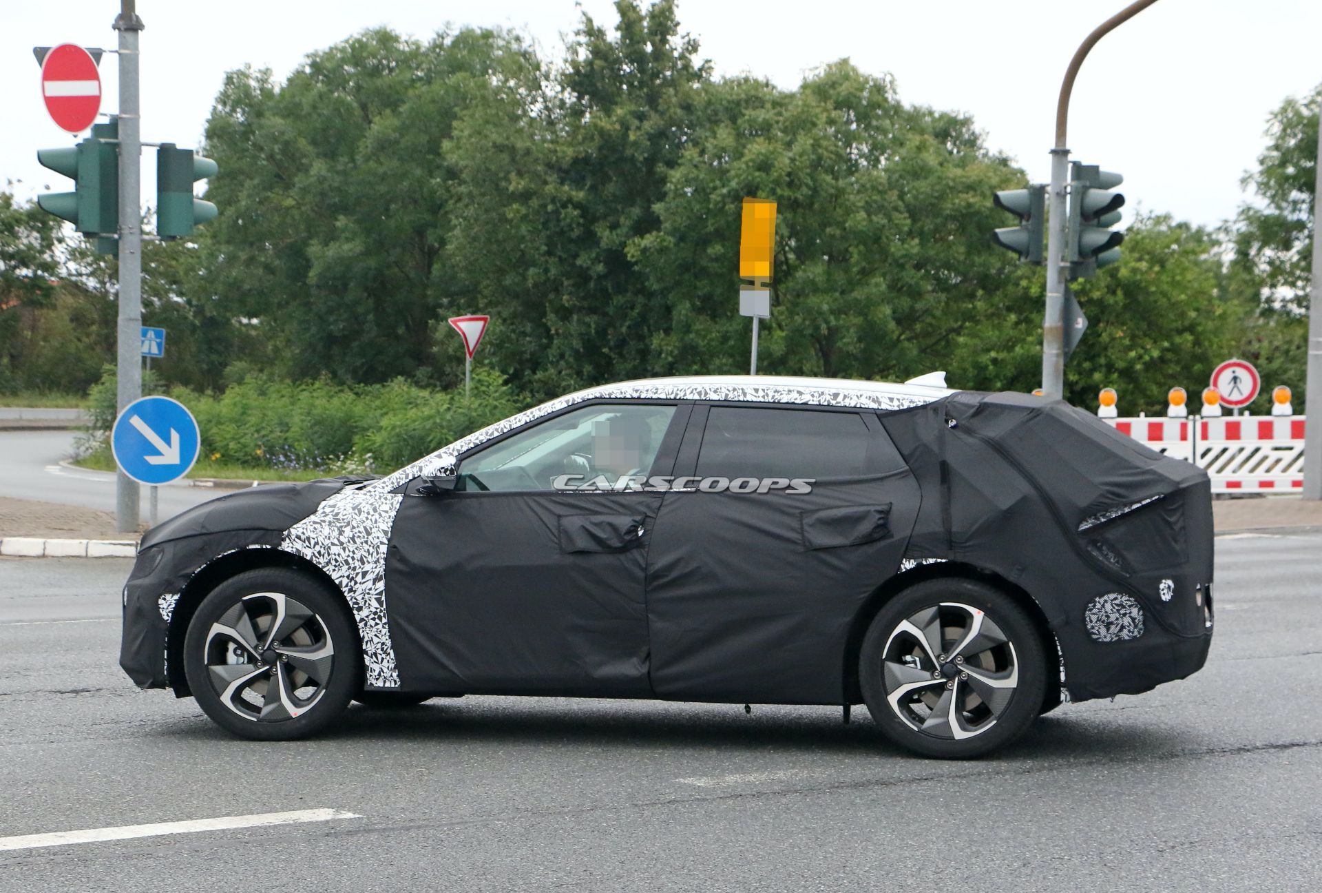 Kia’s New EV Makes Spy Debut, Looks Like A Cross Between Imagine And Futuron Concepts