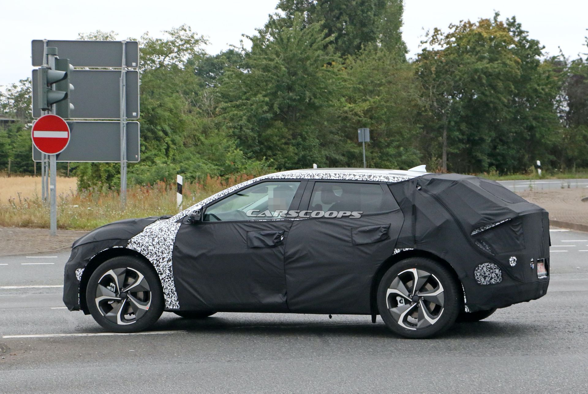 Kia’s New EV Makes Spy Debut, Looks Like A Cross Between Imagine And Futuron Concepts