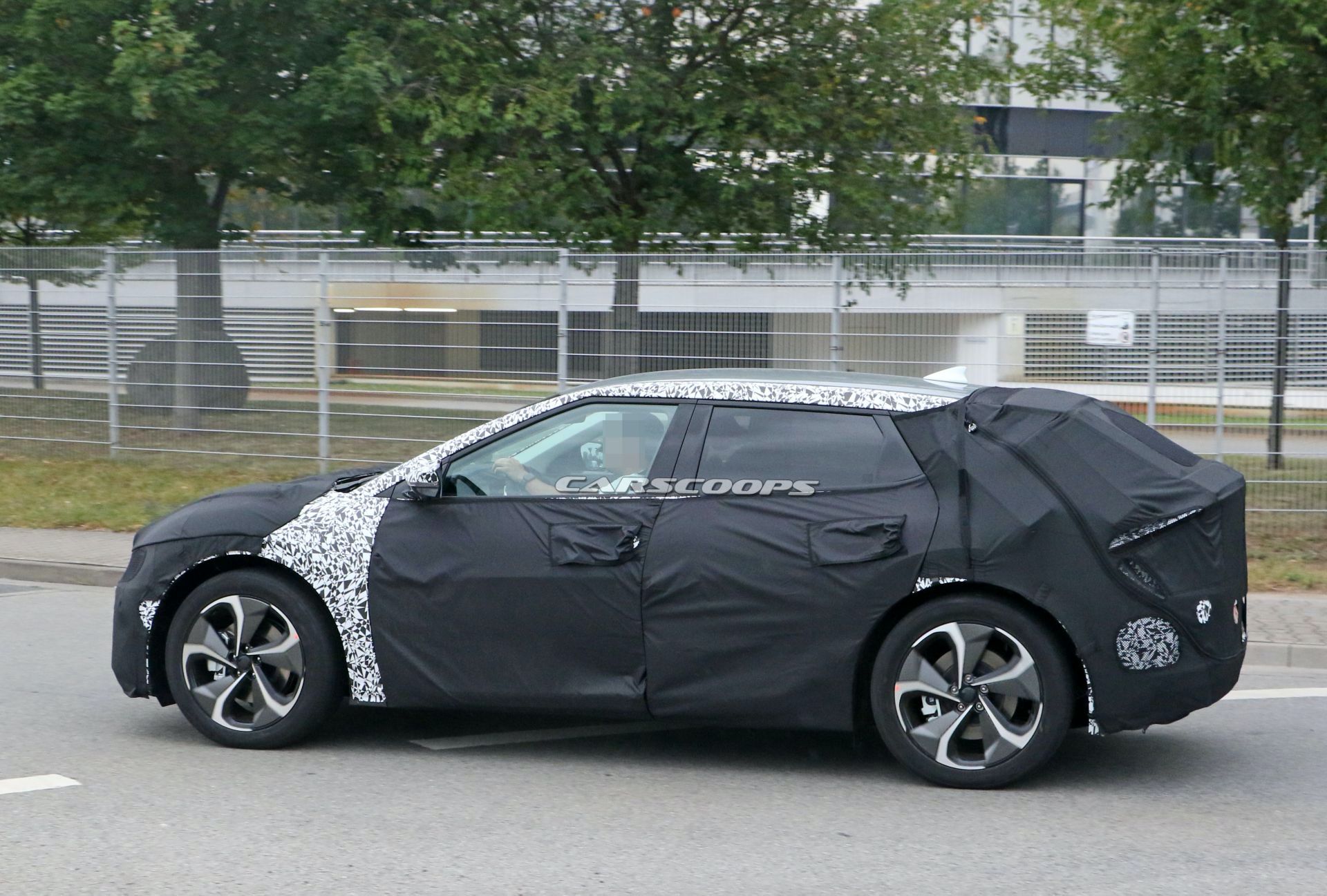 Kia’s New EV Makes Spy Debut, Looks Like A Cross Between Imagine And Futuron Concepts