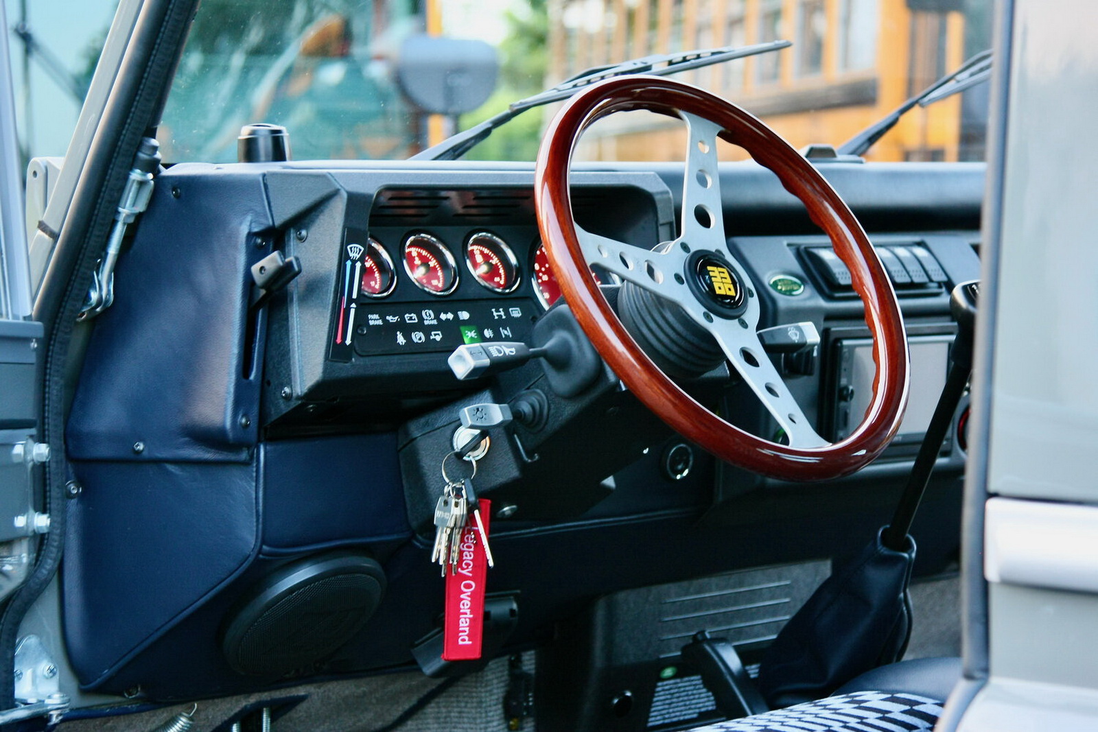 V8-Powered, 450 HP Land Rover Defender Has A Porsche Tartan Interior