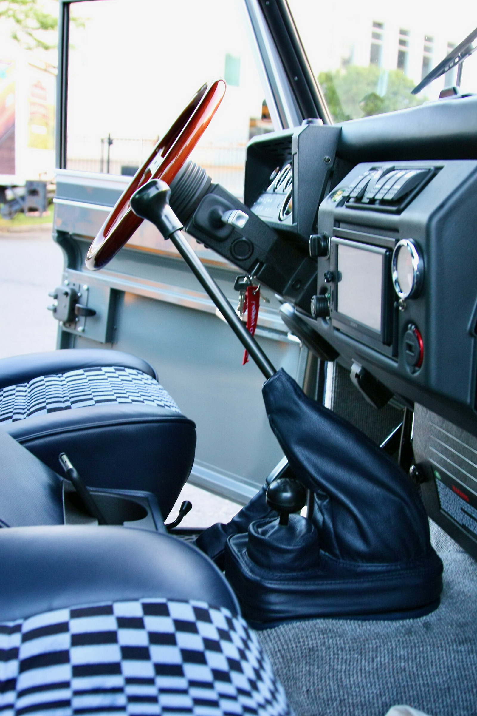 V8-Powered, 450 HP Land Rover Defender Has A Porsche Tartan Interior