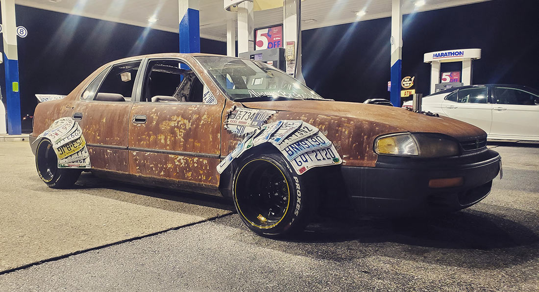 This Rusted Toyota Camry Has Fender Flares Made From License Plates