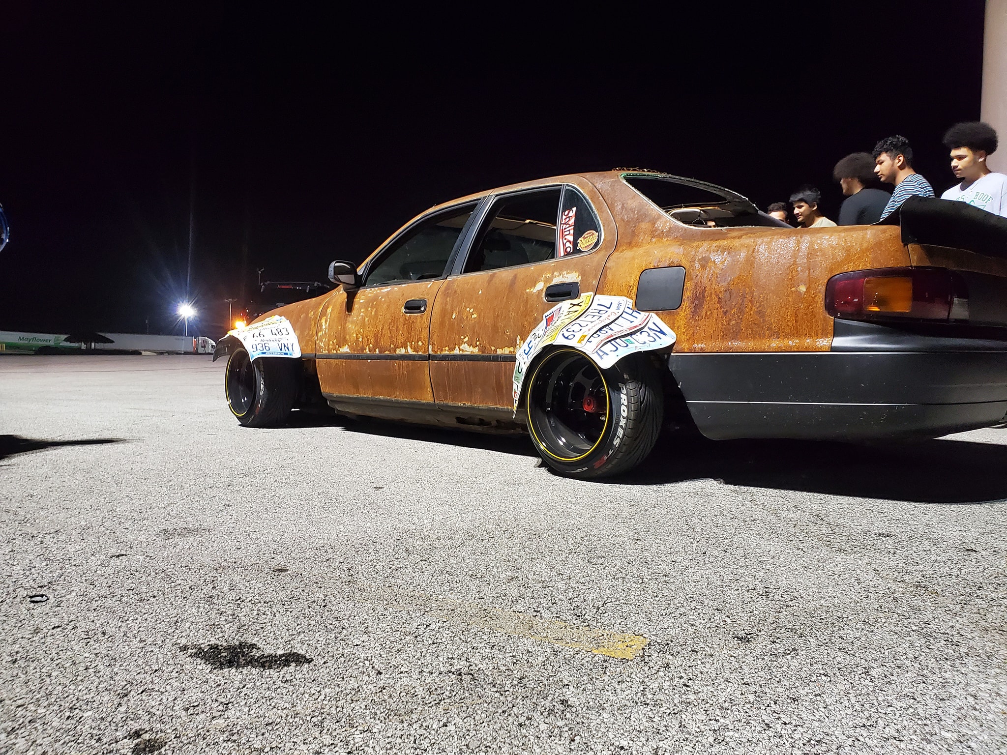 This Rusted Toyota Camry Has Fender Flares Made From License Plates