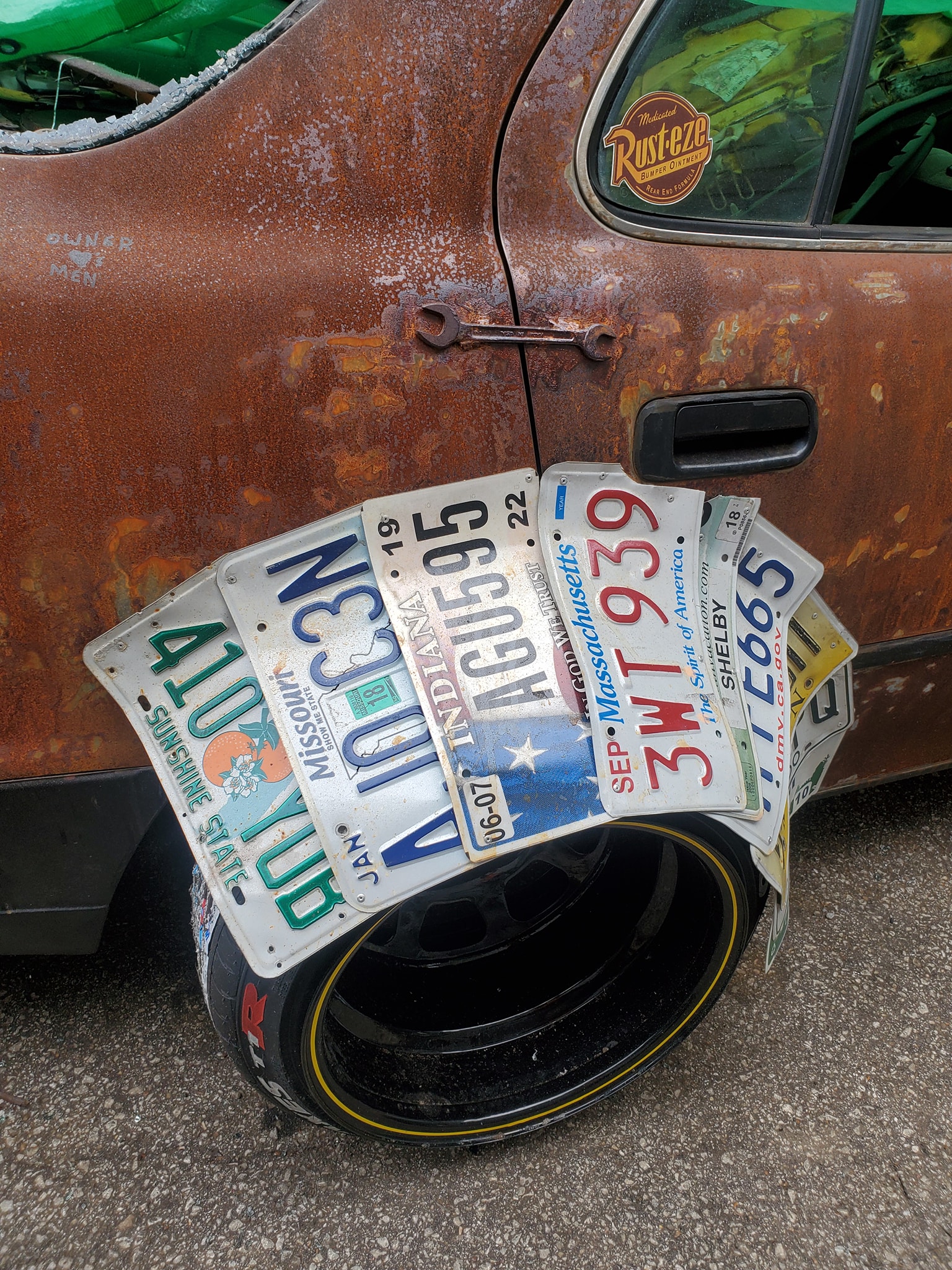 This Rusted Toyota Camry Has Fender Flares Made From License Plates