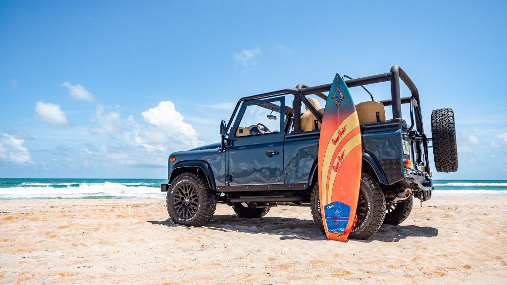 Surf’s Up: Classic Land Rover Defender Gears Up For The Beach