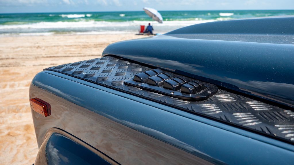 Surf’s Up: Classic Land Rover Defender Gears Up For The Beach