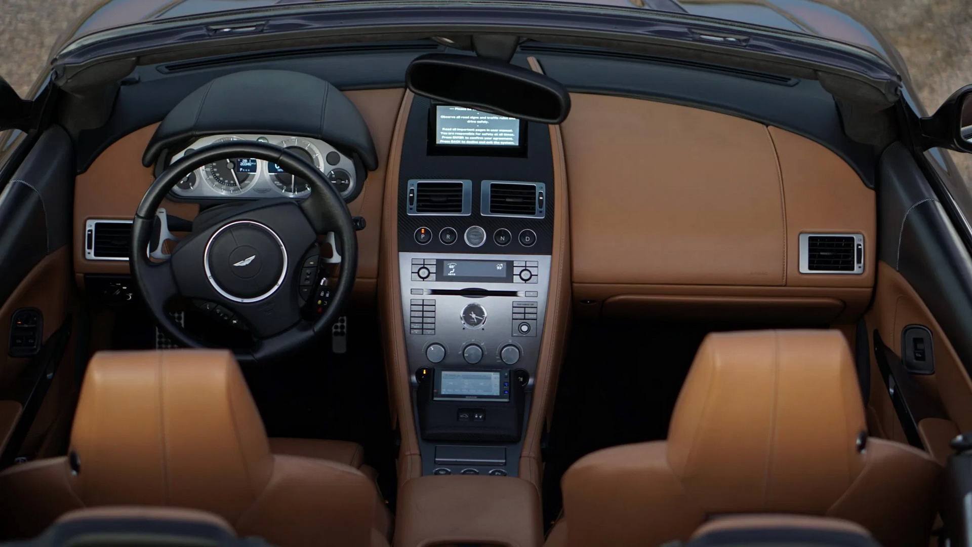 Stay Classy And Bid On This Mansory-Tuned 2007 Aston Martin DB9 Volante