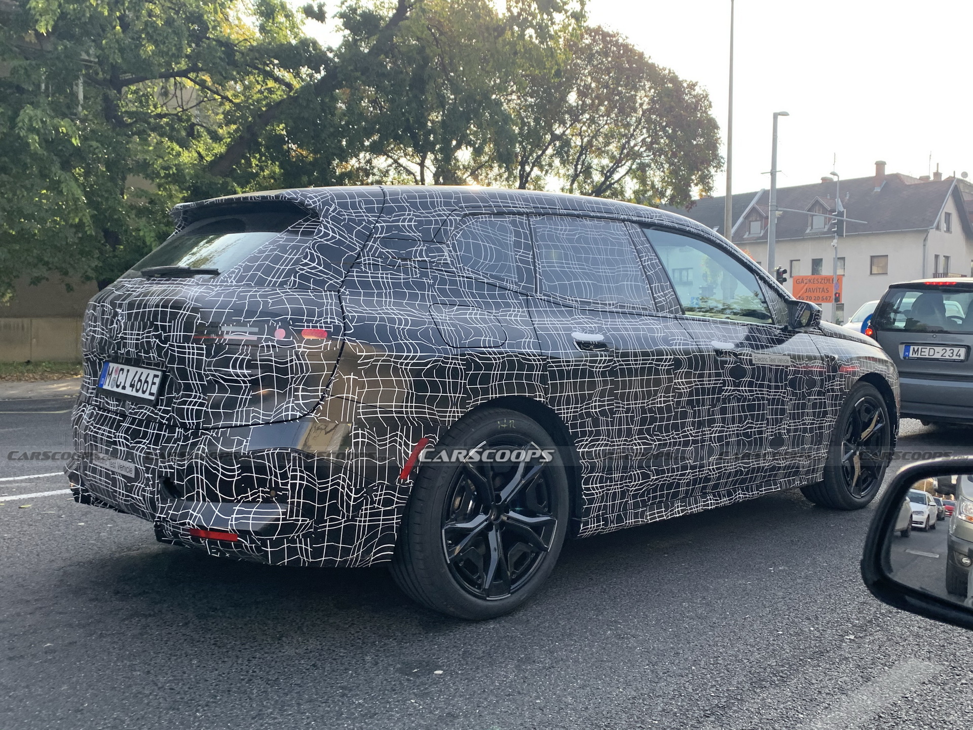 U Spy The BMW iX / iNext Electric SUV Testing In Budapest With Skin Tight Camo