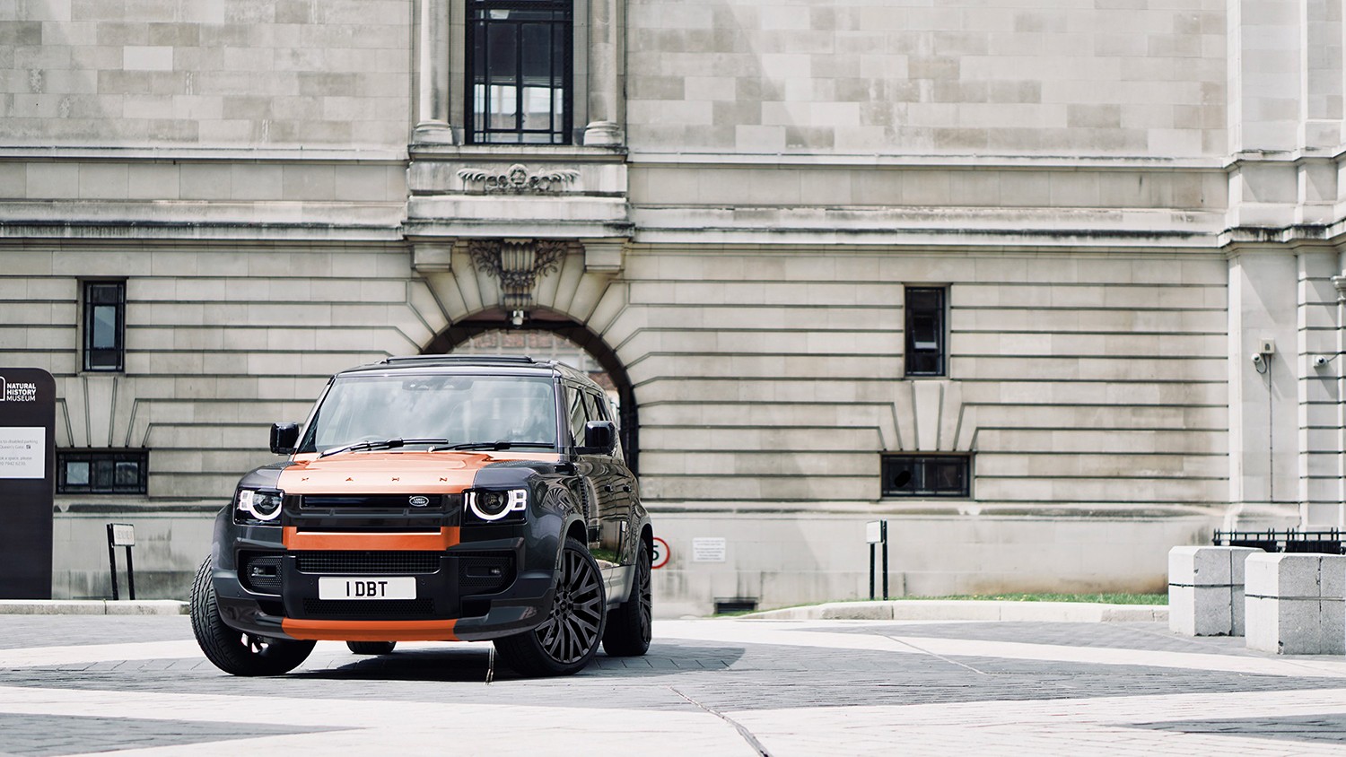 Would You Drive Around In A Black And Orange Land Rover Defender Like This?